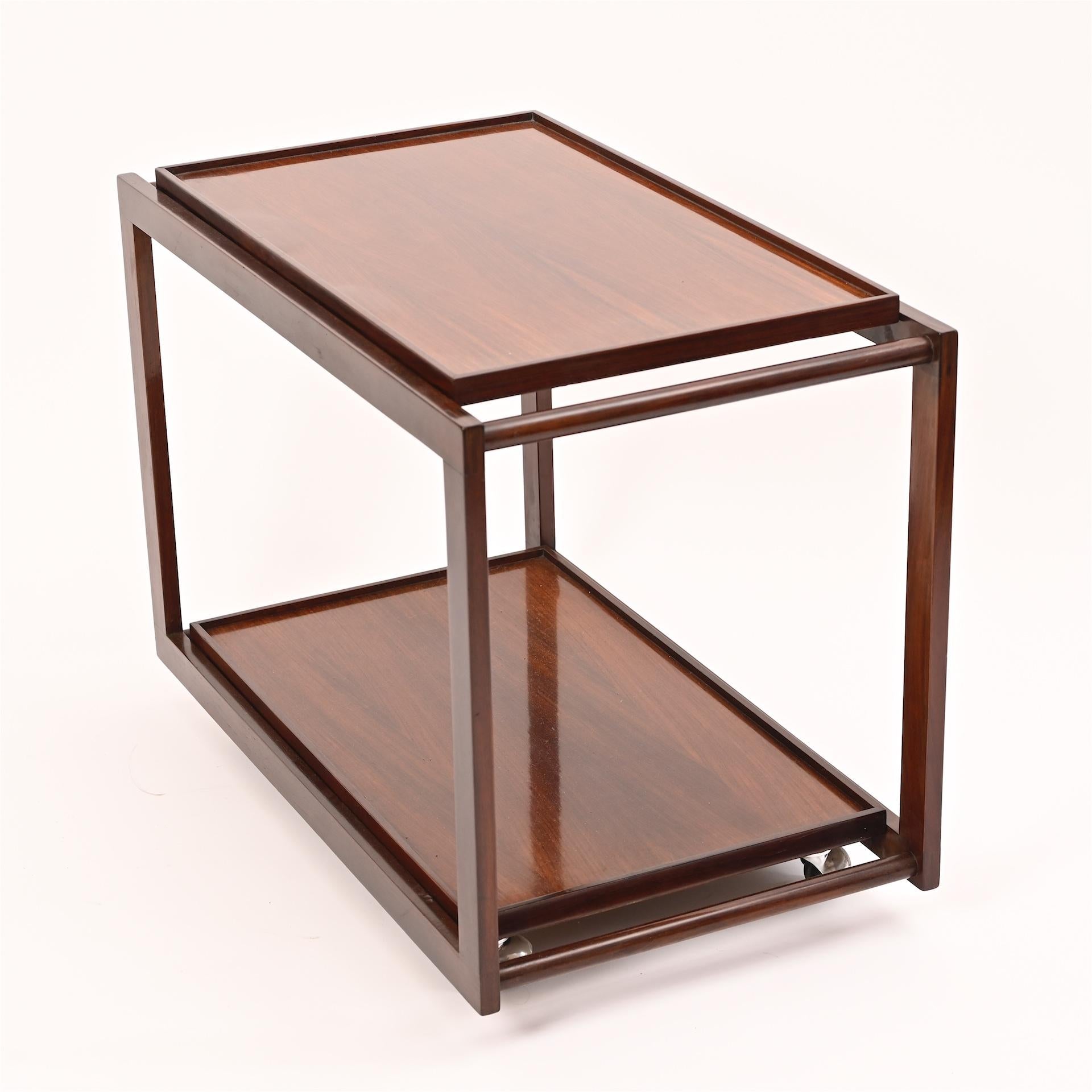 Exotic wood bar / trolley by Cassina. 

Restored and fully working with detachable tray inserts.