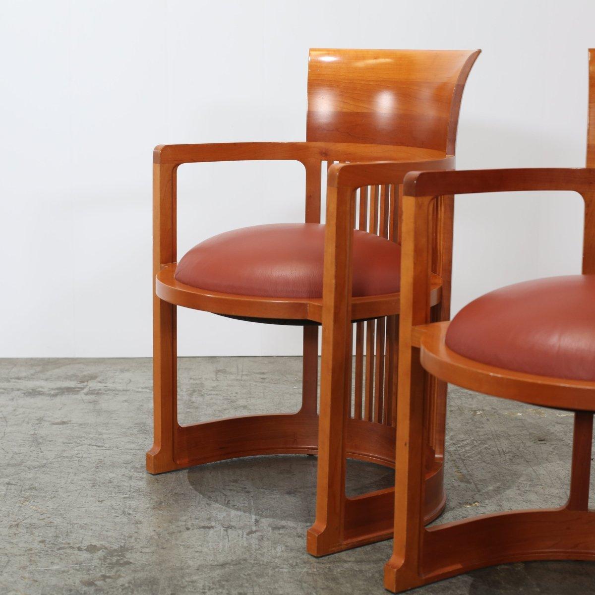 Introducing the iconic Barrel Chair by renowned architect Frank Lloyd Wright, now available at Rehaus. Crafted by Cassina, this chair features a unique barrel-shaped design. The chair is upholstered in luxurious leather, providing both comfort and