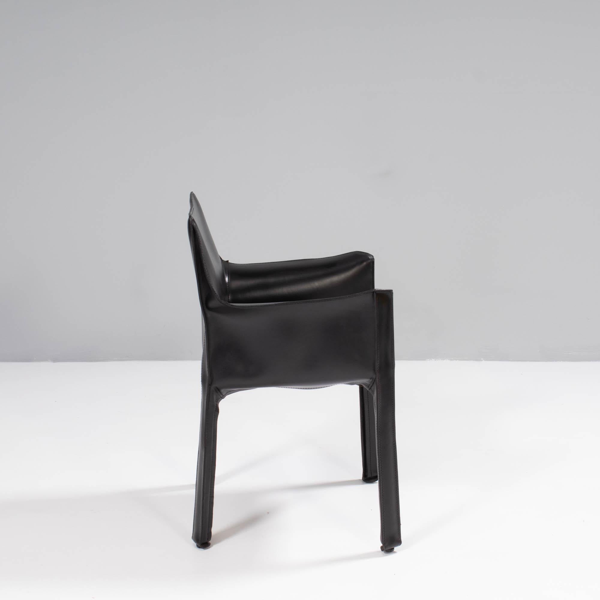 Designed by Mario Bellini in 1977, the Cab dining chairs have since become a signature piece in the Cassina furniture collection.

These original dining chairs are constructed from a steel frame and are covered in black leather upholstery, held in