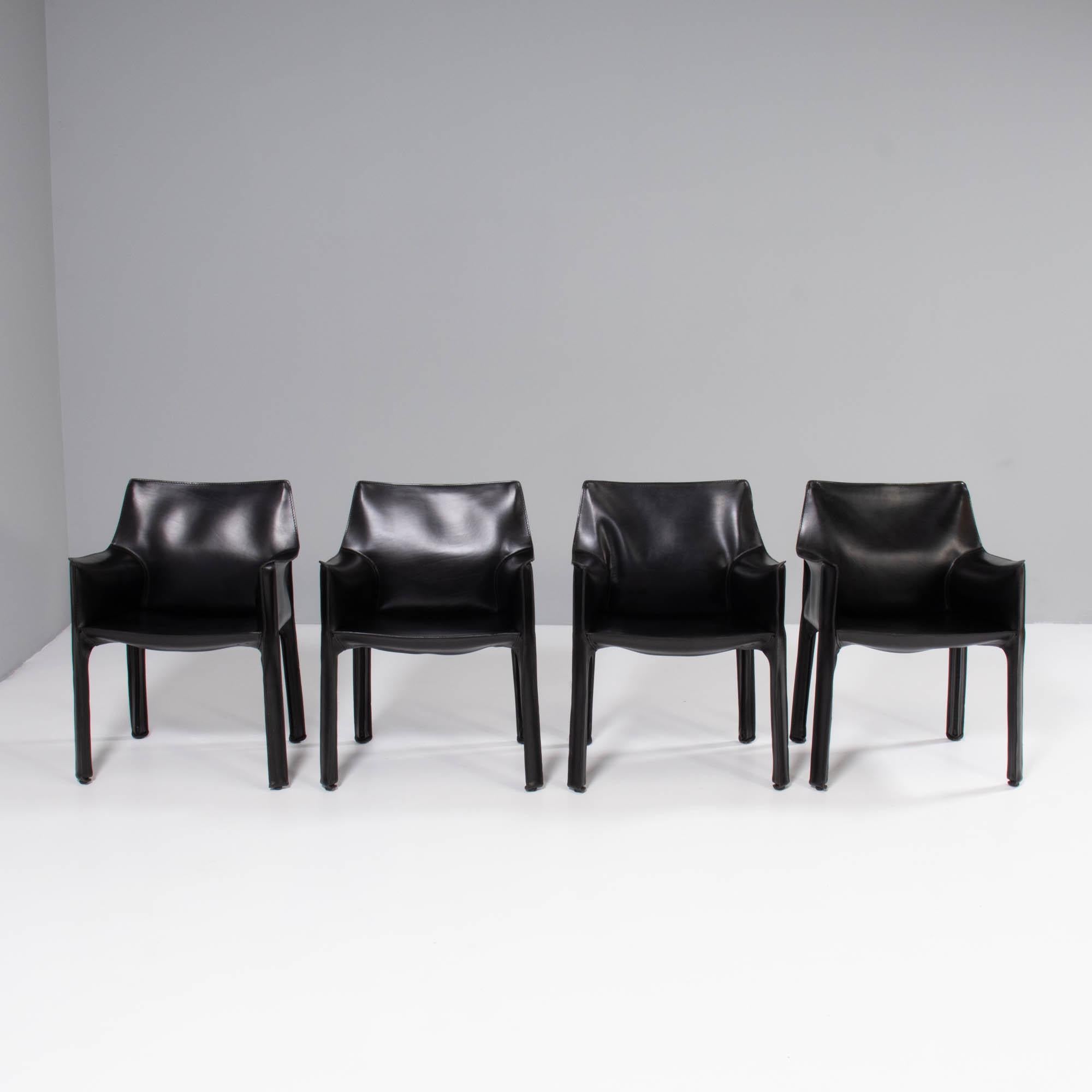 Designed by Mario Bellini in 1977, the Cab dining chairs have since become a signature piece in the Cassina furniture collection.

These original 1970s dining chairs are constructed from a steel frame and are covered in black leather upholstery,