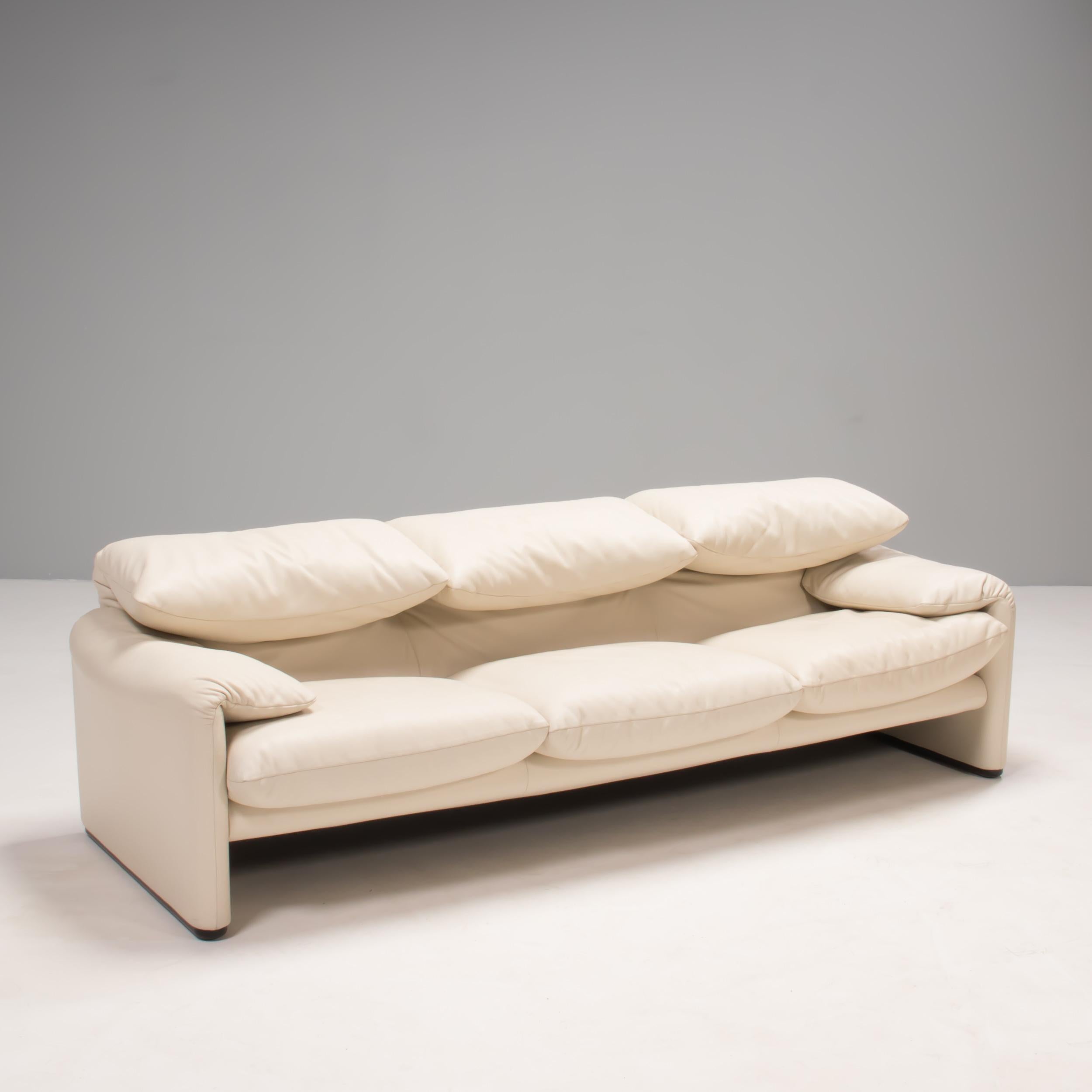 Originally designed by Vico Magistretti for Cassina in 1973, the Maralunga sofa has become a true design icon.

Upholstered in soft beige leather, the sofa features the signature adjustable headrests and folded armrests, while two separate seat