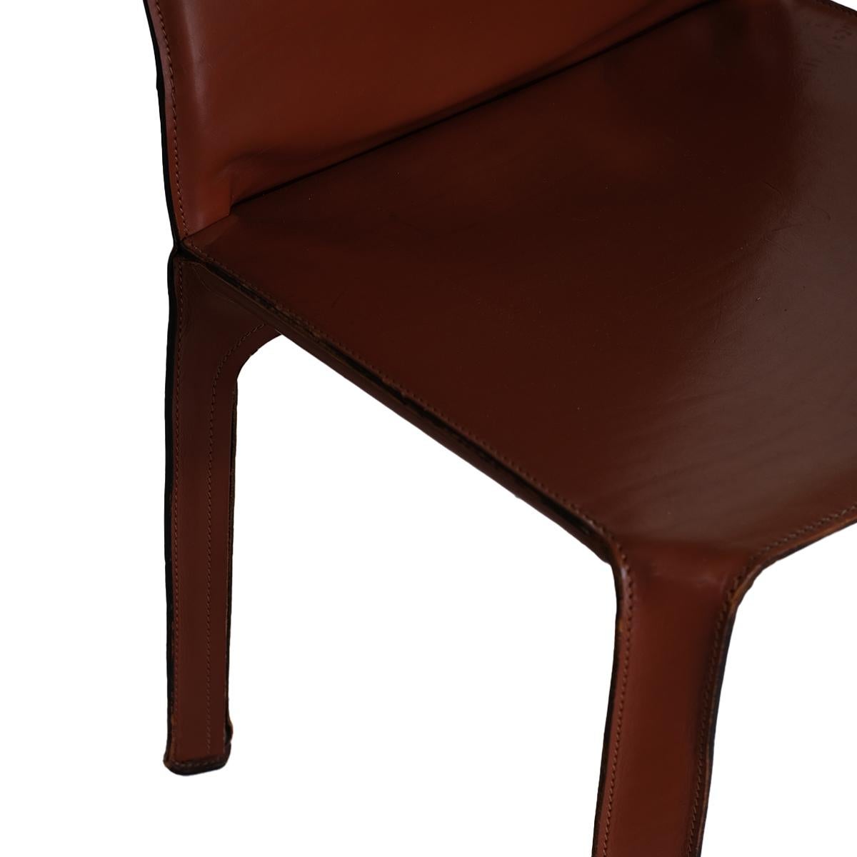Introducing the Mario Bellini for Cassina CAB 412 Chairs in Opulent Leather: Enhance your living area with the epitome of Italian ingenuity and craftsmanship - the Mario Bellini Cassina CAB 412 chairs draped in lavish leather. These chairs transcend