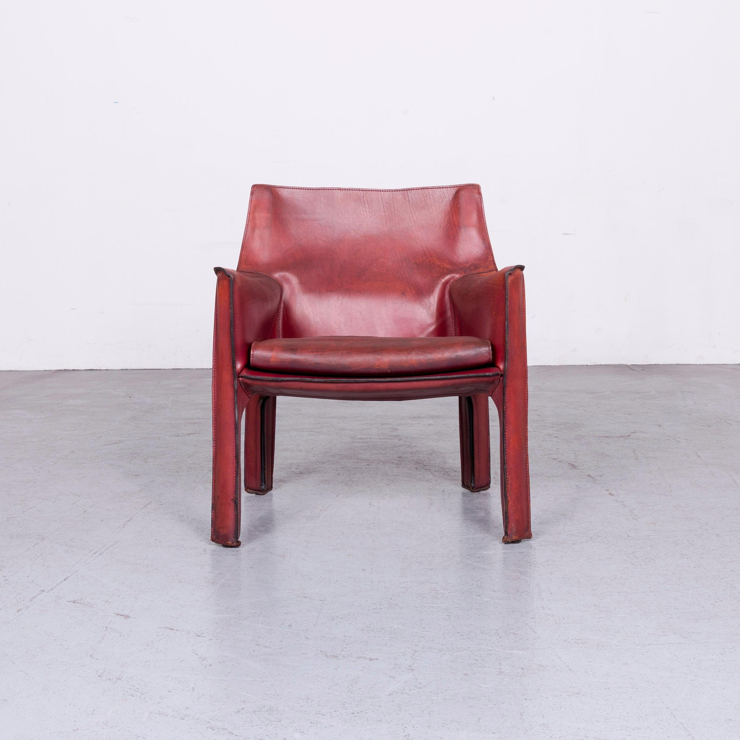 We bring to you a Cassina Cab 414 Vintage Leather Armchair Red by Mario Belinni 1970-1979