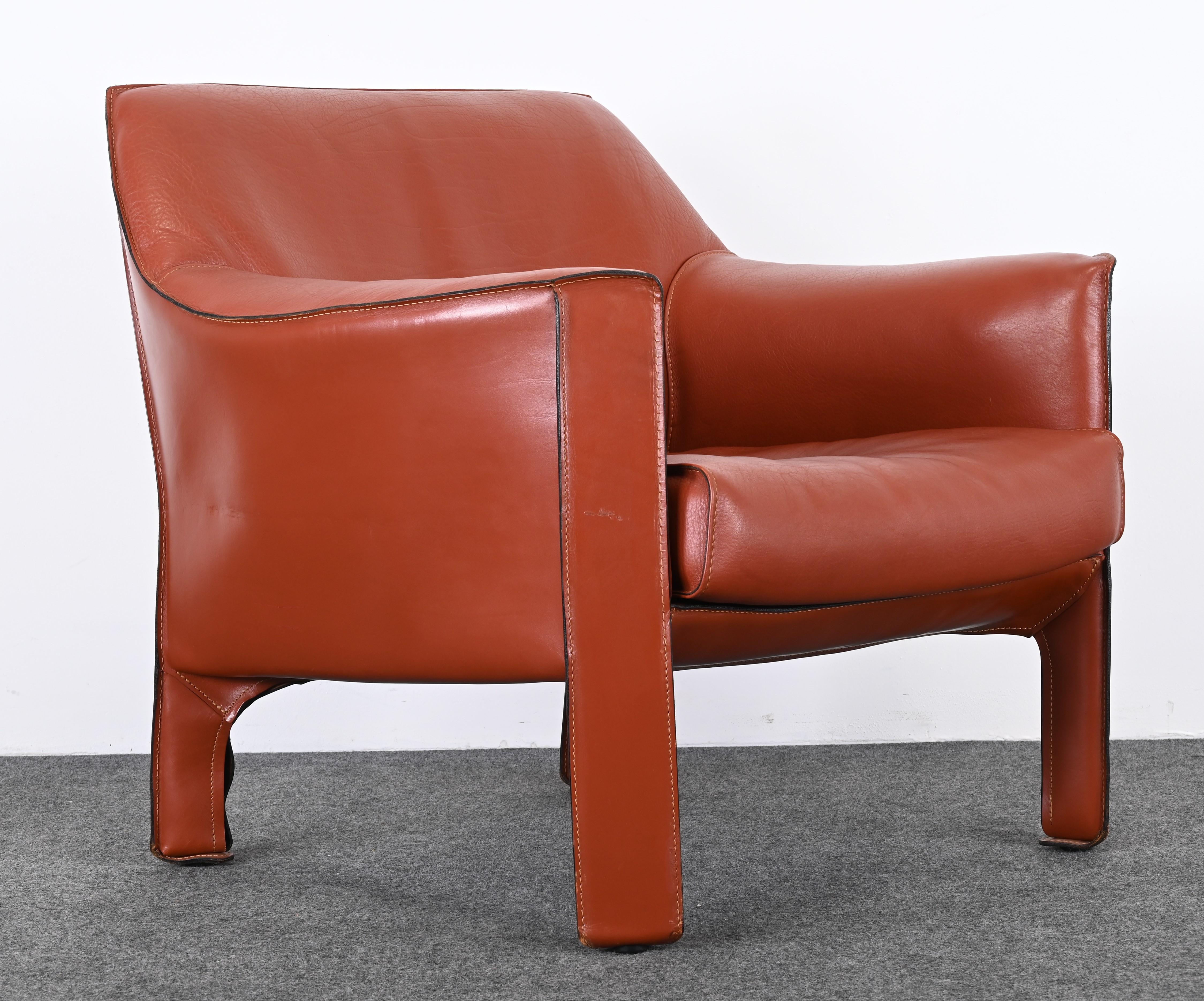 A beautiful 415 leather cab chair designed by architect and designer Mario Bellini for Cassina. This chair is no longer in production and is highly sought after. As seen in the MoMa and other design magazines it is a design classic. Would look great