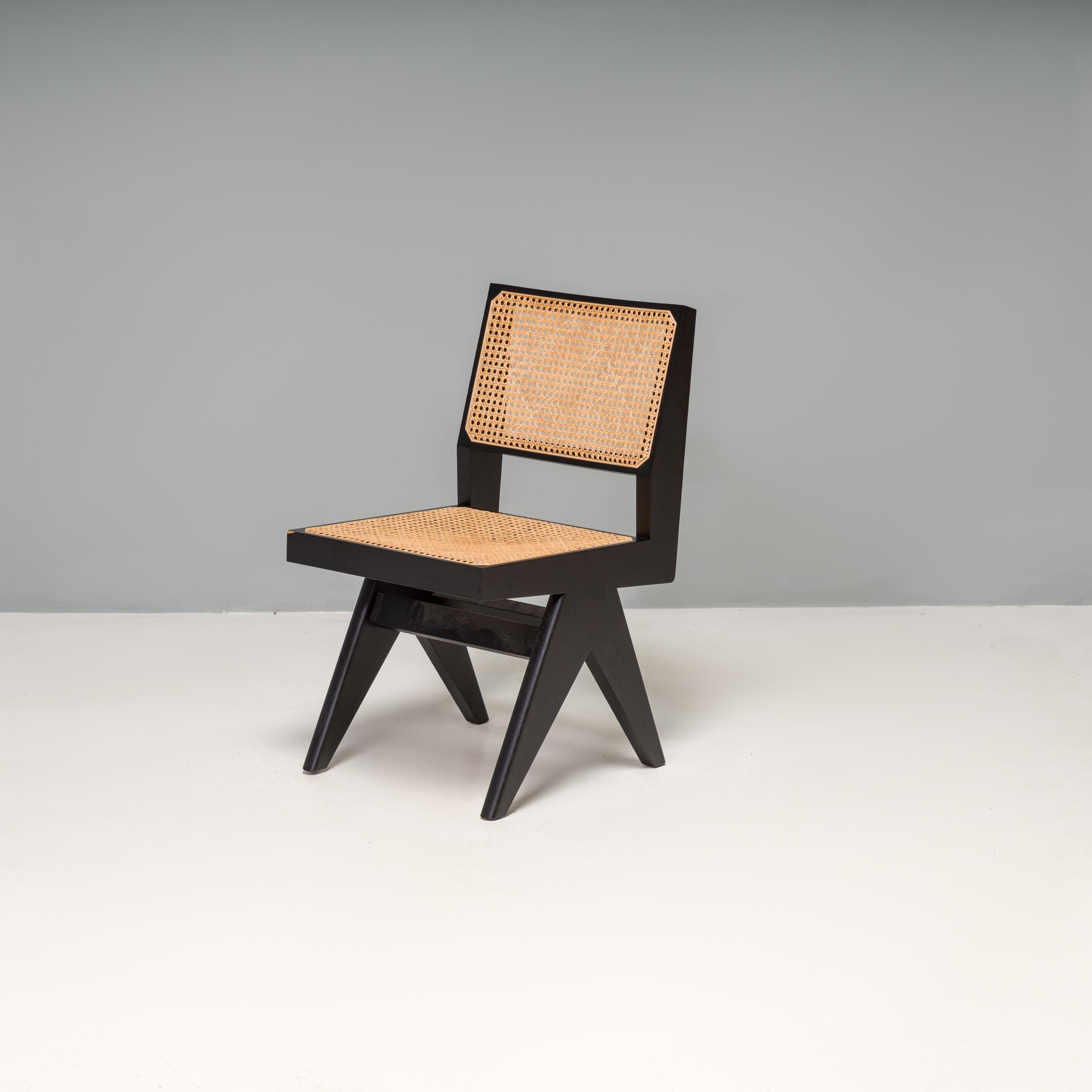 Reissued by Cassina in 2019 this version of the complex chair is part of the Hommage à Pierre Jeanneret collection. The chair was originally designed for Le Corbusier’s Capitol Complex building in Chandigarh.

Constructed from a solid oak frame