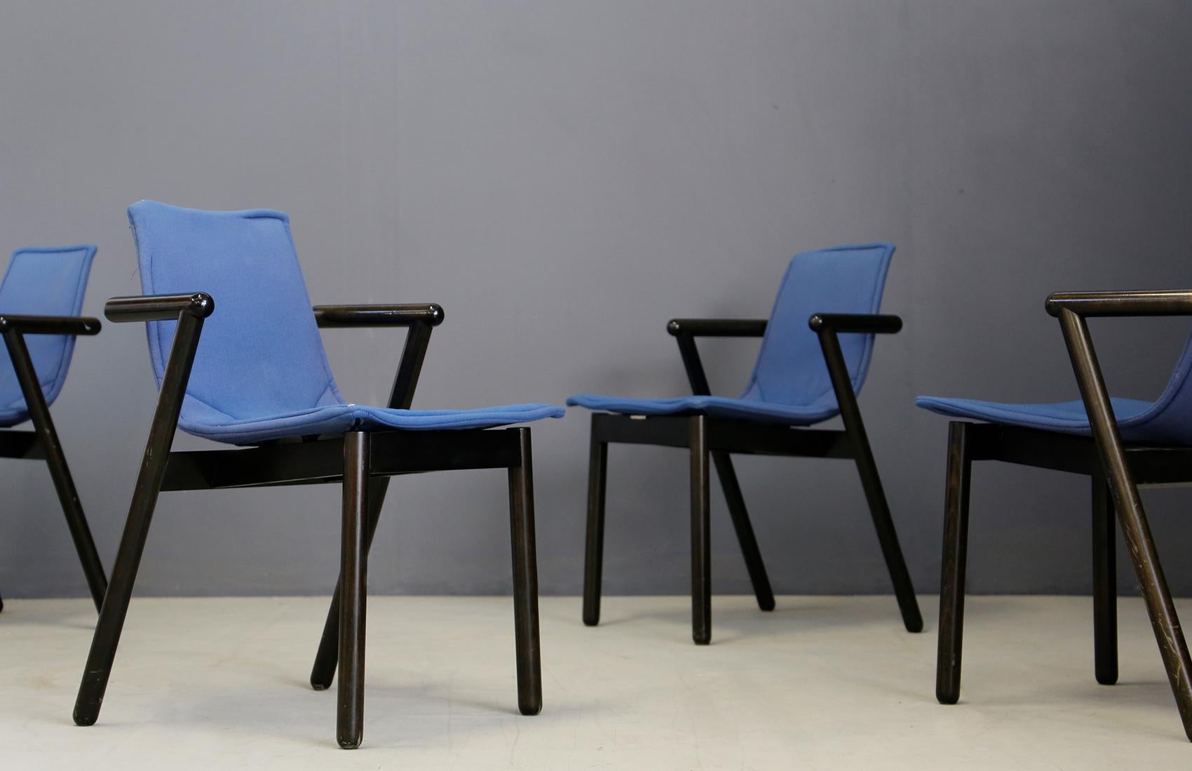 Set of 4 chairs Cassina manufacture. Black lacquered tubular wood structure. Its cover for seat and backrest is in blue fabric with zipper cover. Each chair has the original label under the seat. The chairs have a very geometric design in fact they