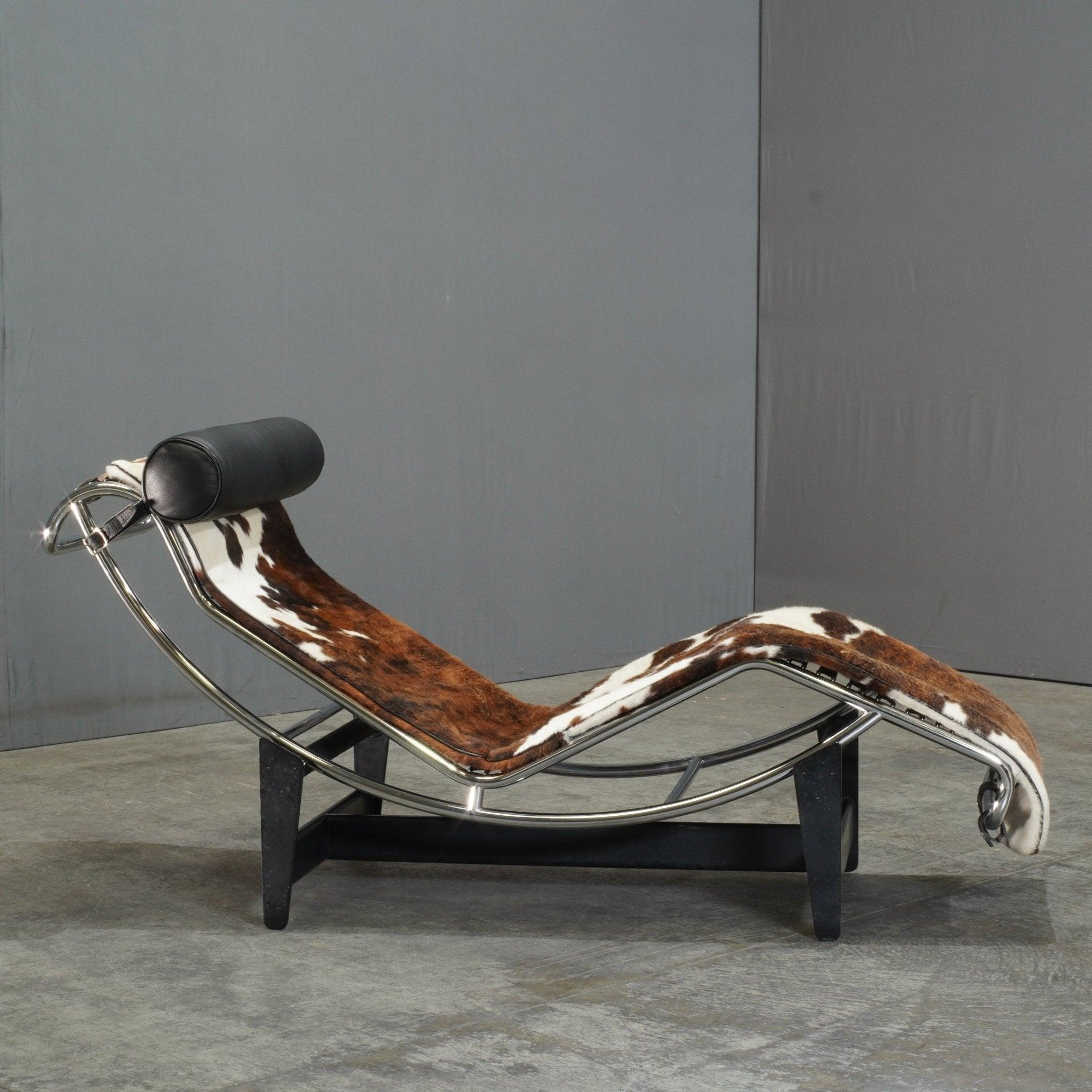 The Cassina LC4 Chaise Lounge by Charlotte Perriand, Pierre Jeanneret, and Le Corbusier is a design icon, embodying the perfect harmony between form and function. Crafted with a tubular steel frame, this chaise offers adjustable recline angles to