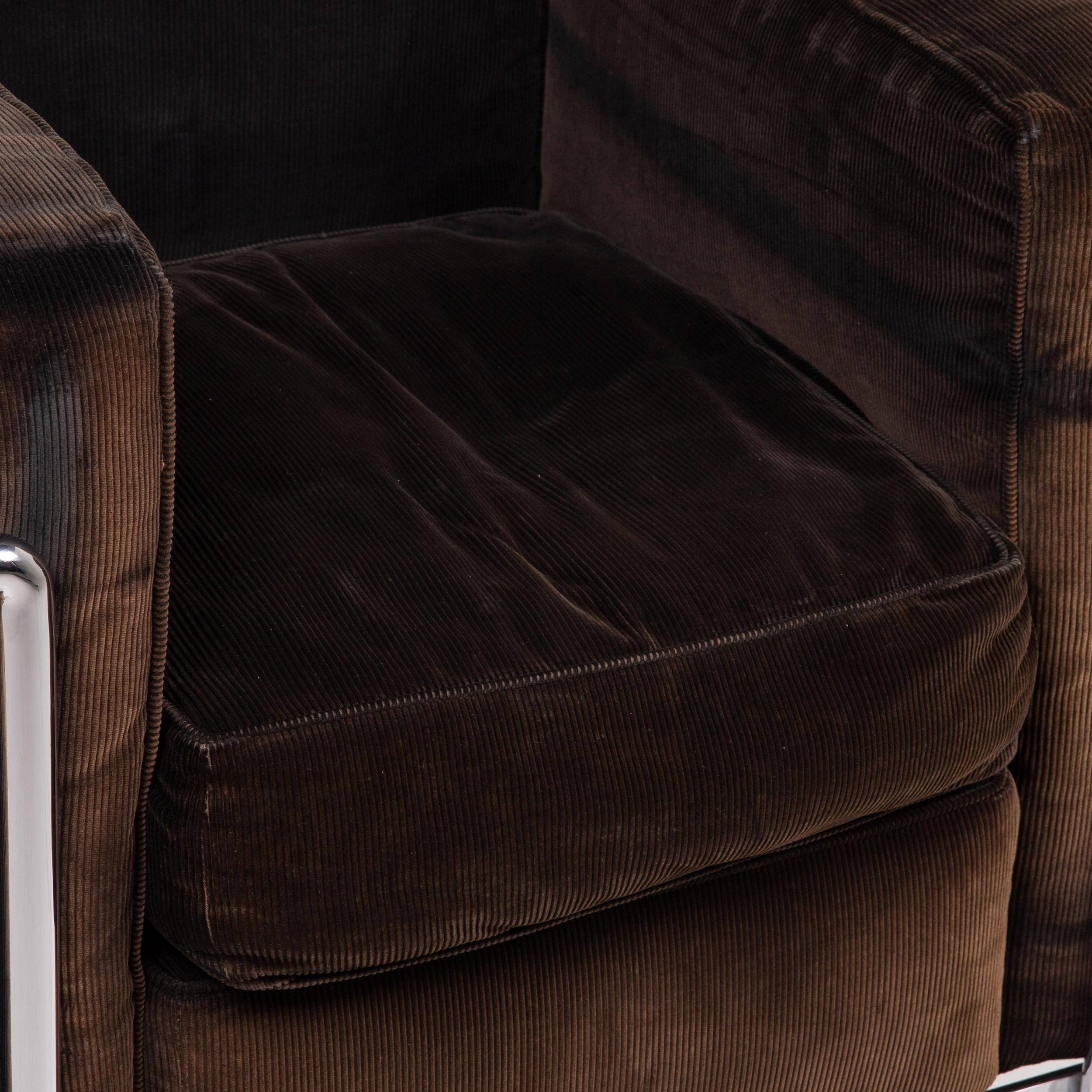 dark brown fabric armchair