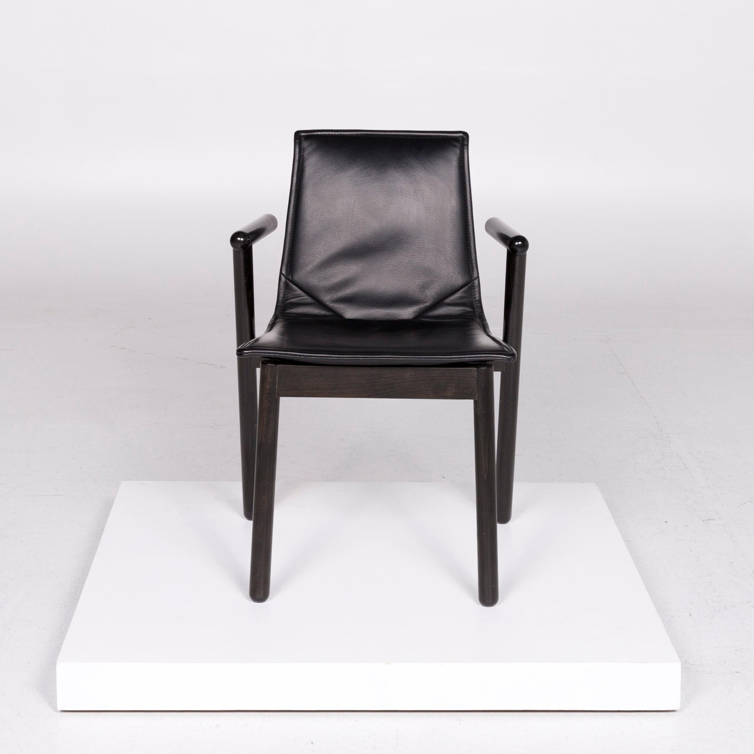 We bring to you a Cassina leather armchair black chair diner dining chair.
 
 Product measurements in centimeters:
 
Depth 53
Width 52
Height 77
Seat-height 46
Rest-height 62
Seat-depth 38
Seat-width 44
Back-height 33.
 