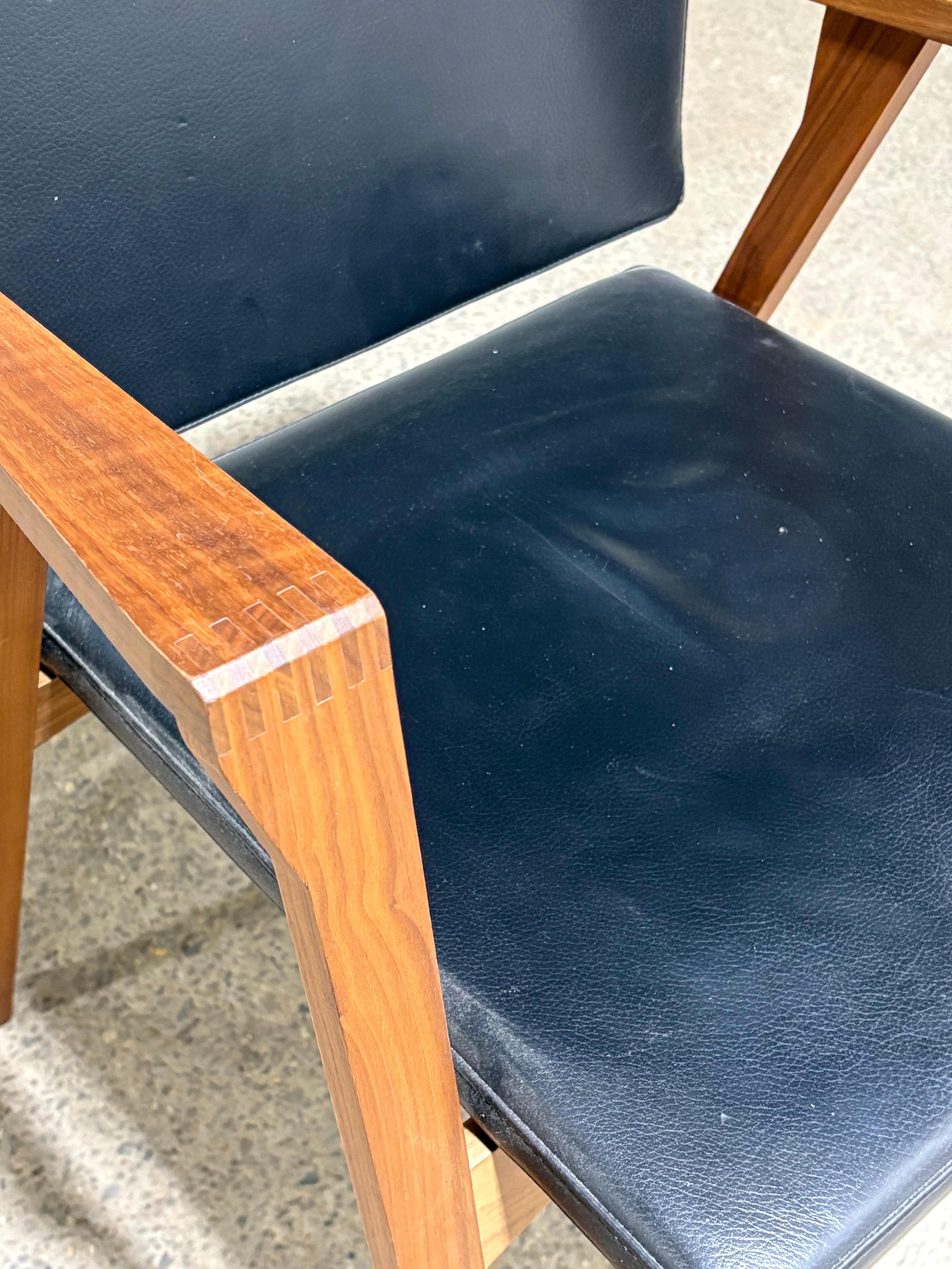 Beautifully constructed chair with floating back design.

Signed by Cassina. 

Two available. Priced individually. 