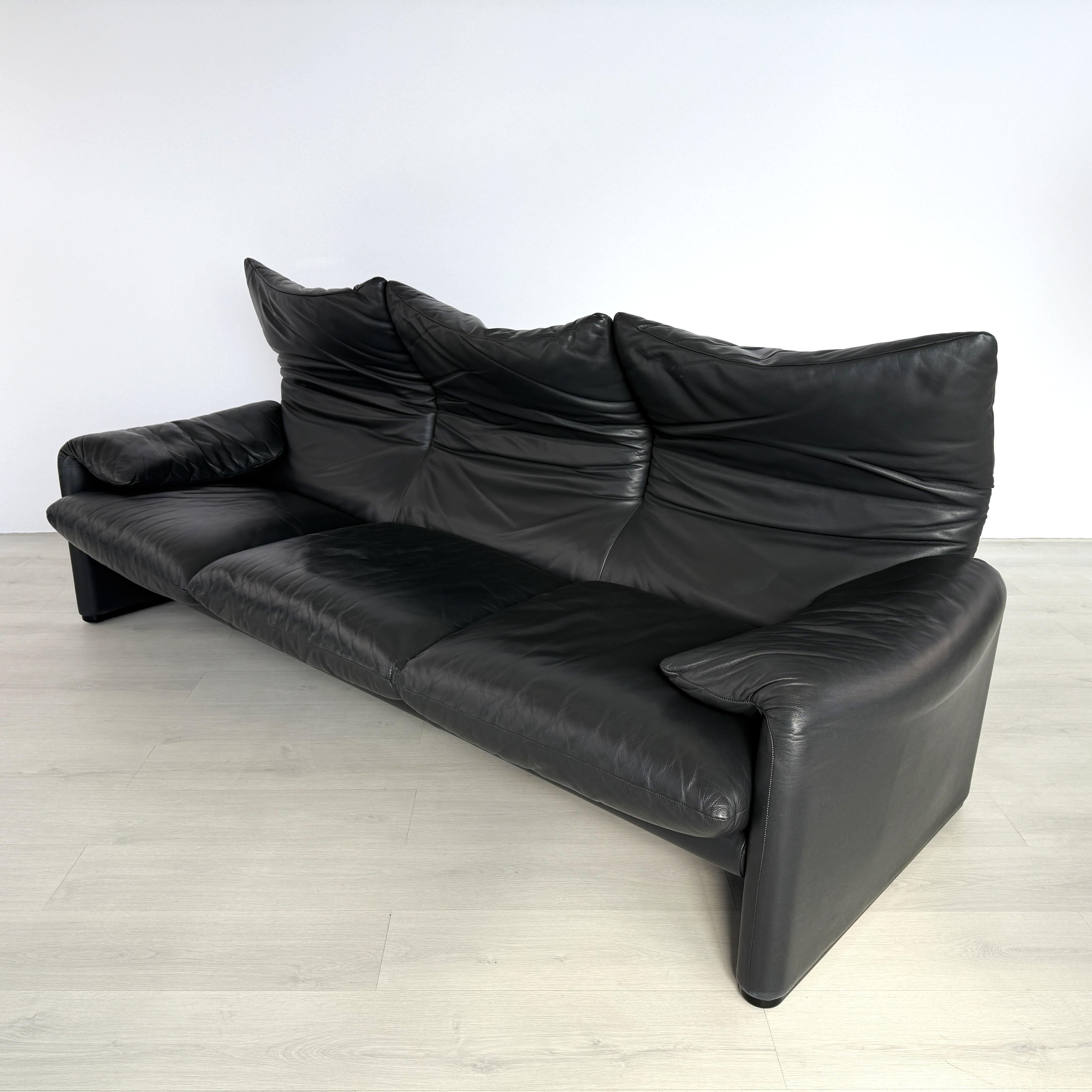 Dimensions: H 27.5” x W 94” x D 35” x SH 17.5”

Italian black leather 3-seater sofa, designed by Vico Magistretti for Cassina Maralunga from 1970s with practical foldable headrest. In excellent vintage condition.


Please see our other listings for