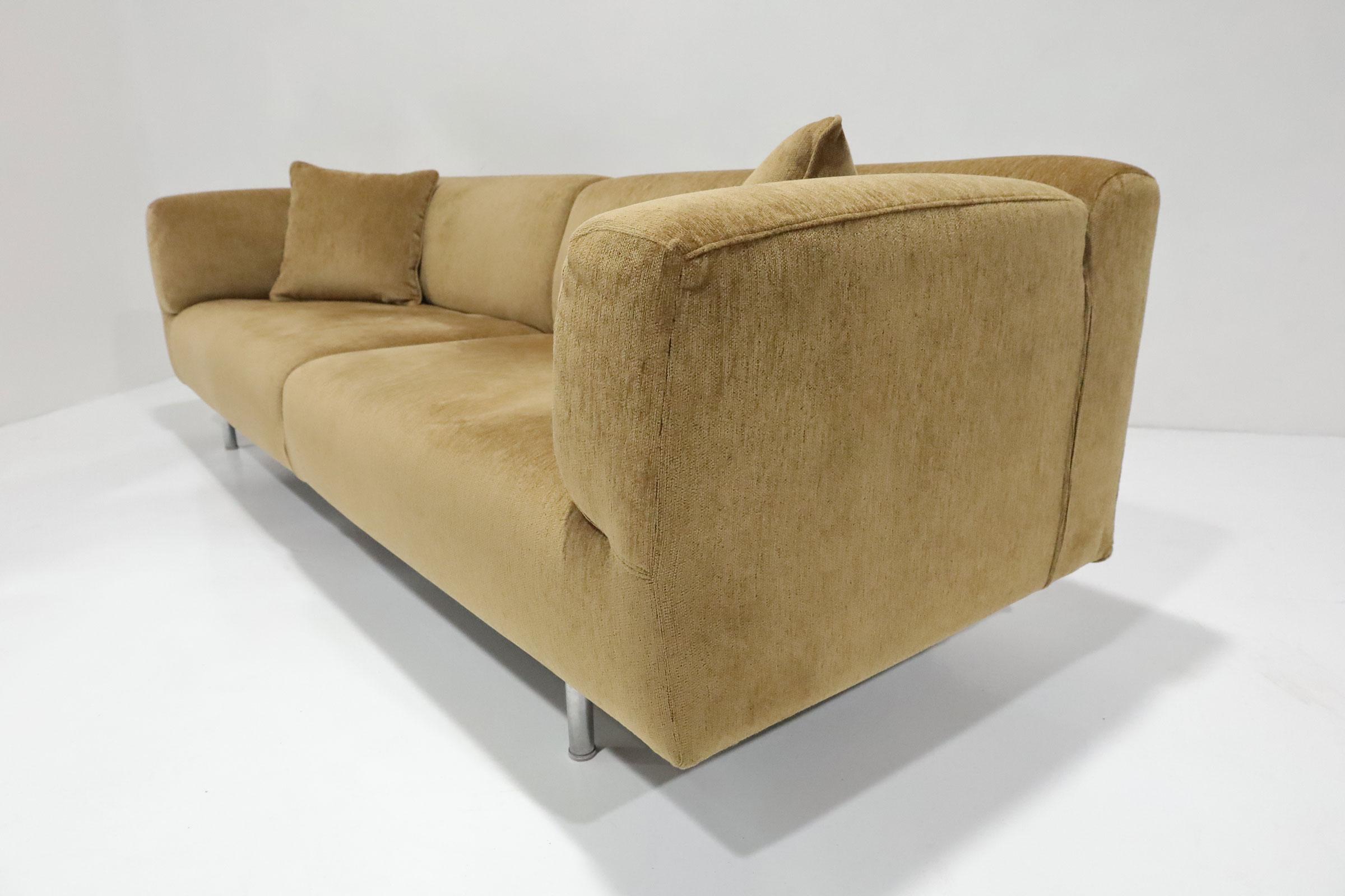 Cassina Met 250 Sofa designed by Piero Lissoni. Covers can be removed for cleaning. Frames are made of steel and the upholstery comes in differentiated density CFC - free polyurethane foam and polyester padding. The feet are in polished or grey