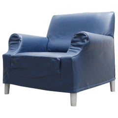 Fauteuil de travail Lazy modèle Cassina en cuir bleu de Philippe Starck