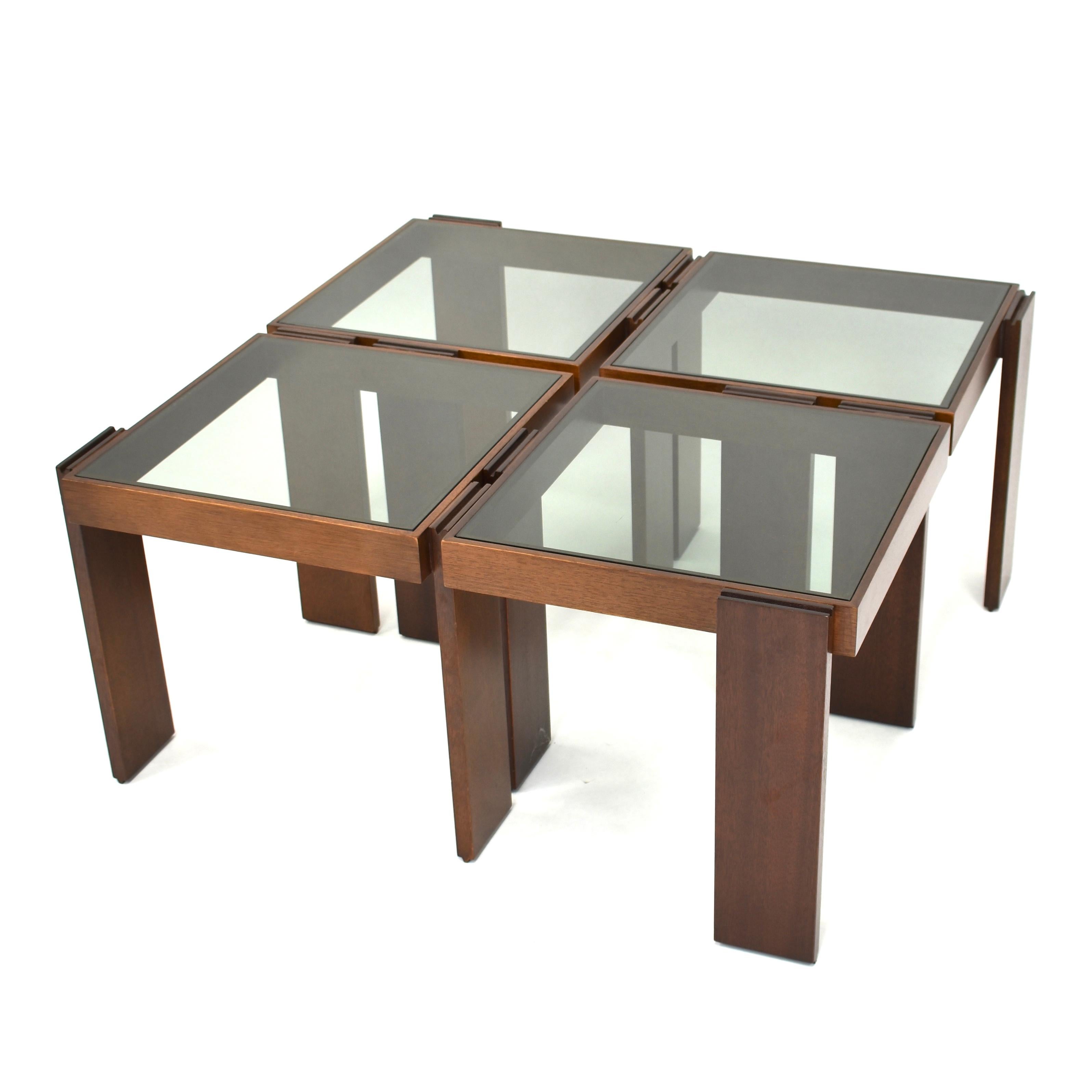 Cool set of four coffee tables. The tables can be arranged in various ways (Squared, L-shaped, S-shaped, etc.) They can also be stacked on top of each other to create a showcase.
These coffee tables has many options in your living room such as a