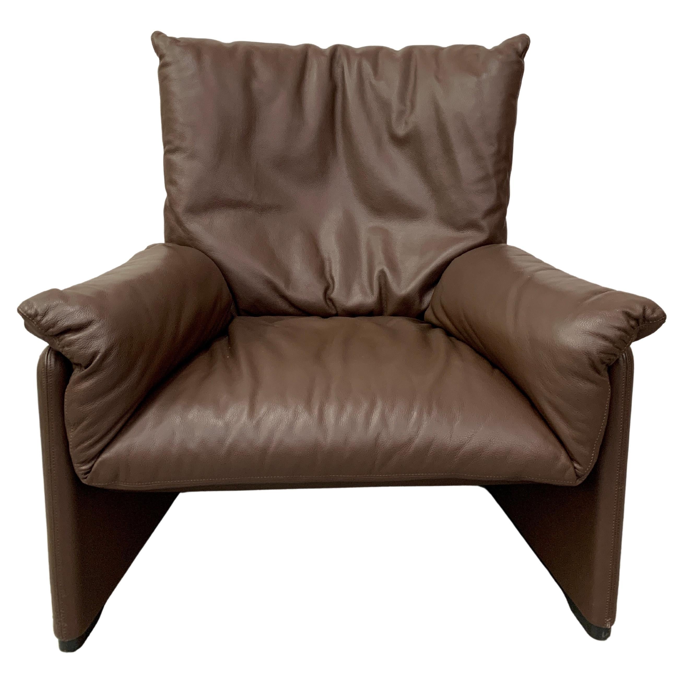 Thick chocolate brown leather lounge chair designed by Vico Magistretti
Chair measures 36.5
