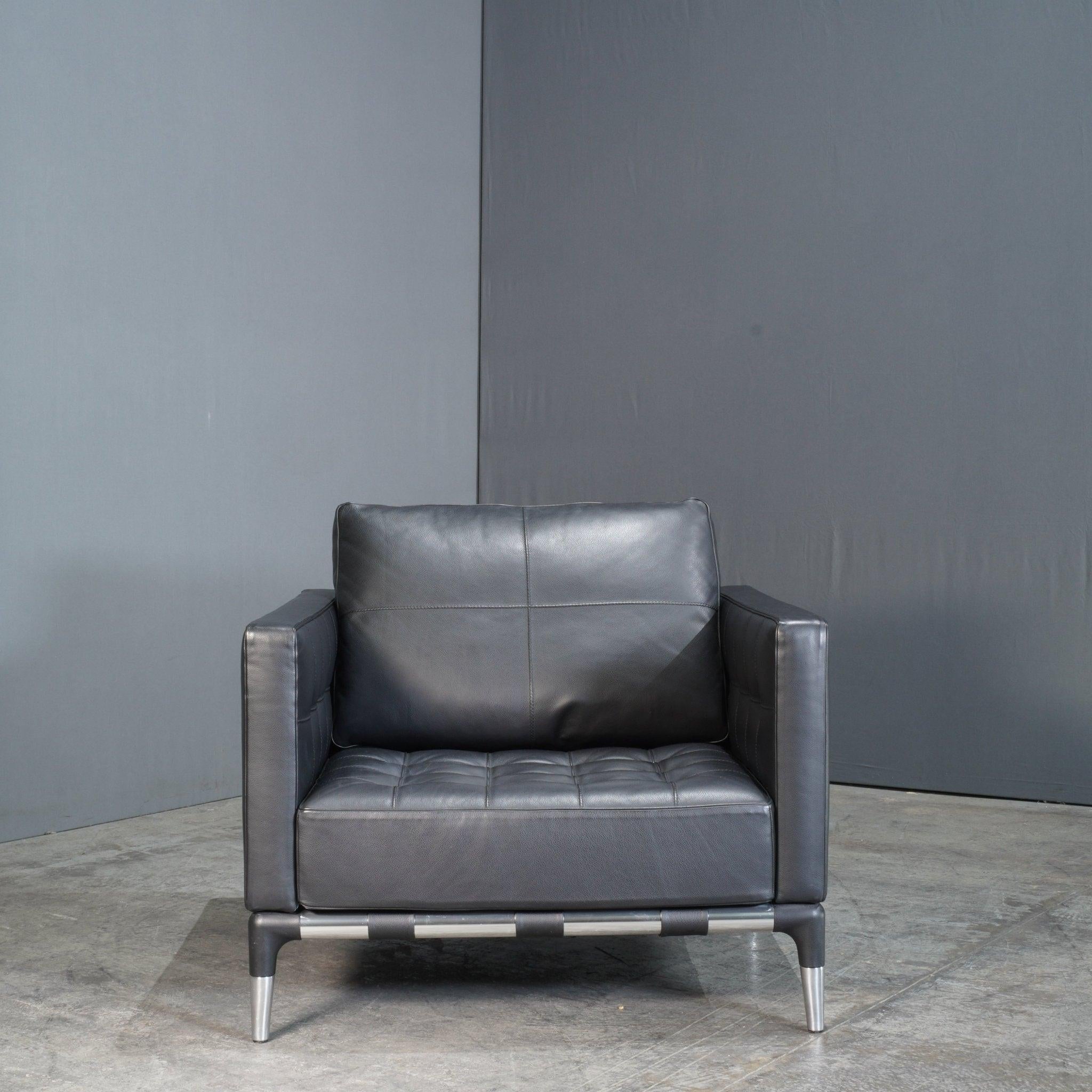 The Cassina Privé Armchair in Black Leather by Philippe Starck is a masterclass in modern luxury and design. Upholstered in sumptuous black leather, this armchair combines bold, clean lines with the sophistication that is emblematic of Starck's