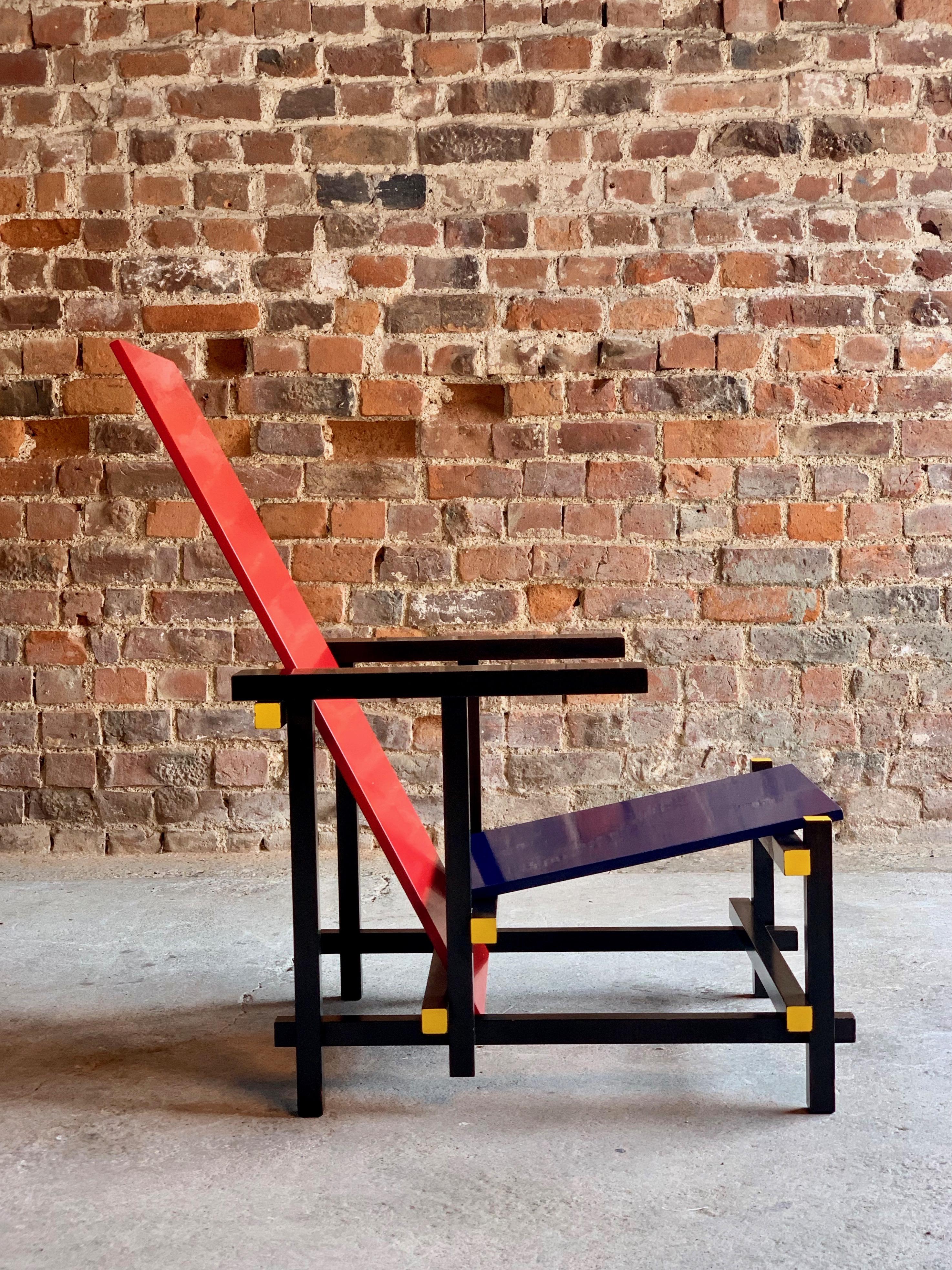 Cassina red and blue chair by Gerrit T Rietveld numbered 8488, Italy, circa 1970

?Cassina red and blue chair originally designed by Gerrit Rietveld, numbered 8488 and with makers marks to the underside, The Red and Blue armchair is an iconic