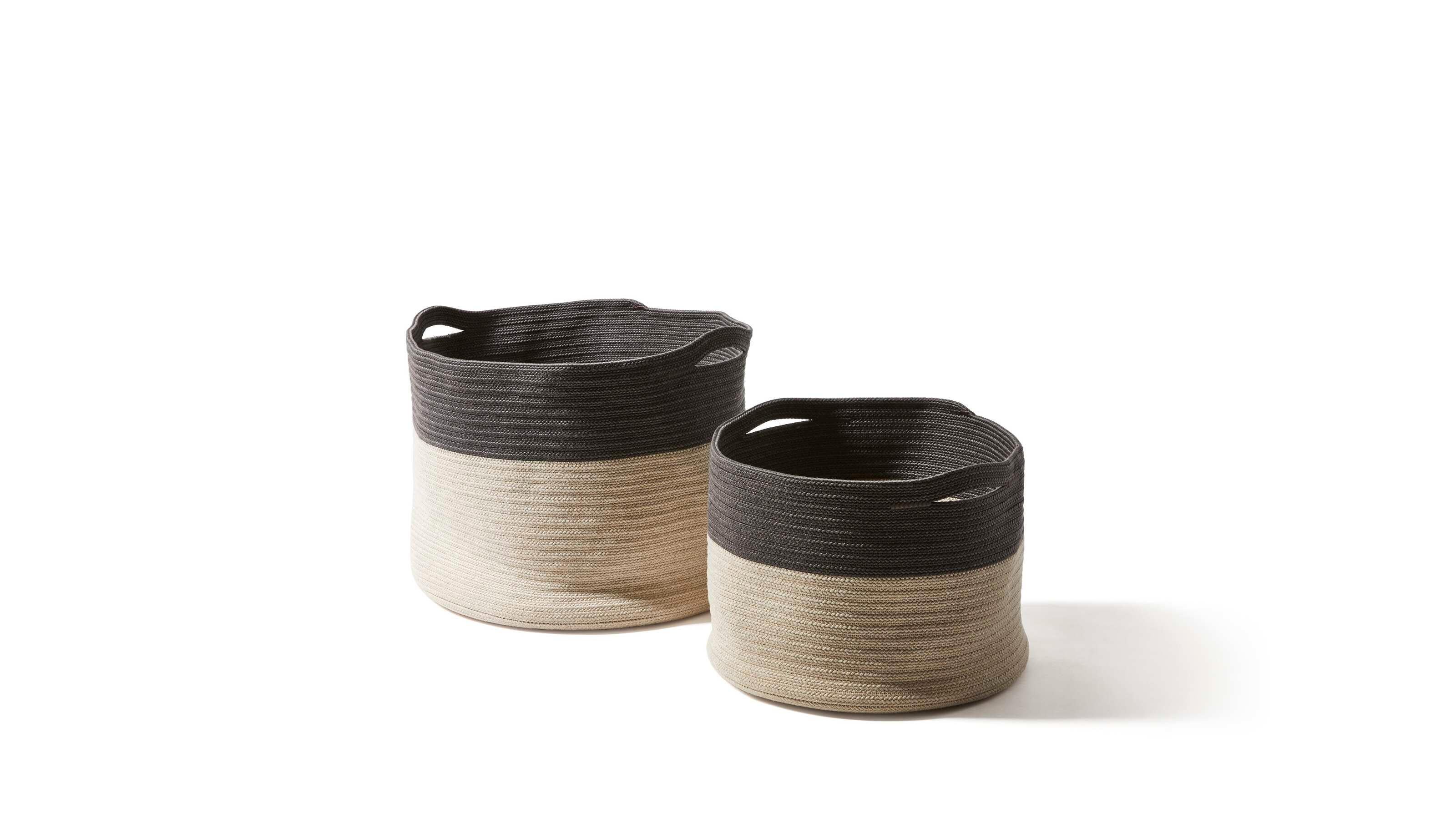 Cassina Set of Two Podor Outdoor Accessories 

Outdoor accessories complete the Cassina lineup of furnishings for open-air living and dining areas. The baskets are inspired by the shapes and brilliant colors of the wicker baskets made by African