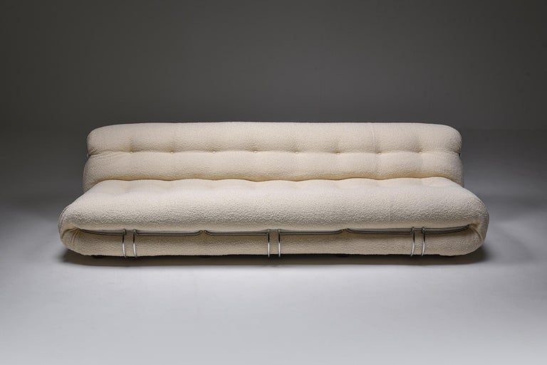 Afra and Tobia Scarpa, soriana, Cassina, Italy 1970s, bouclé wool

Manufactured by Cassina in the 1970s, the Soriana collection was meant to express beauty and comfort by using a whole bundle of fabric held by a chrome-plated steel clamp.
The