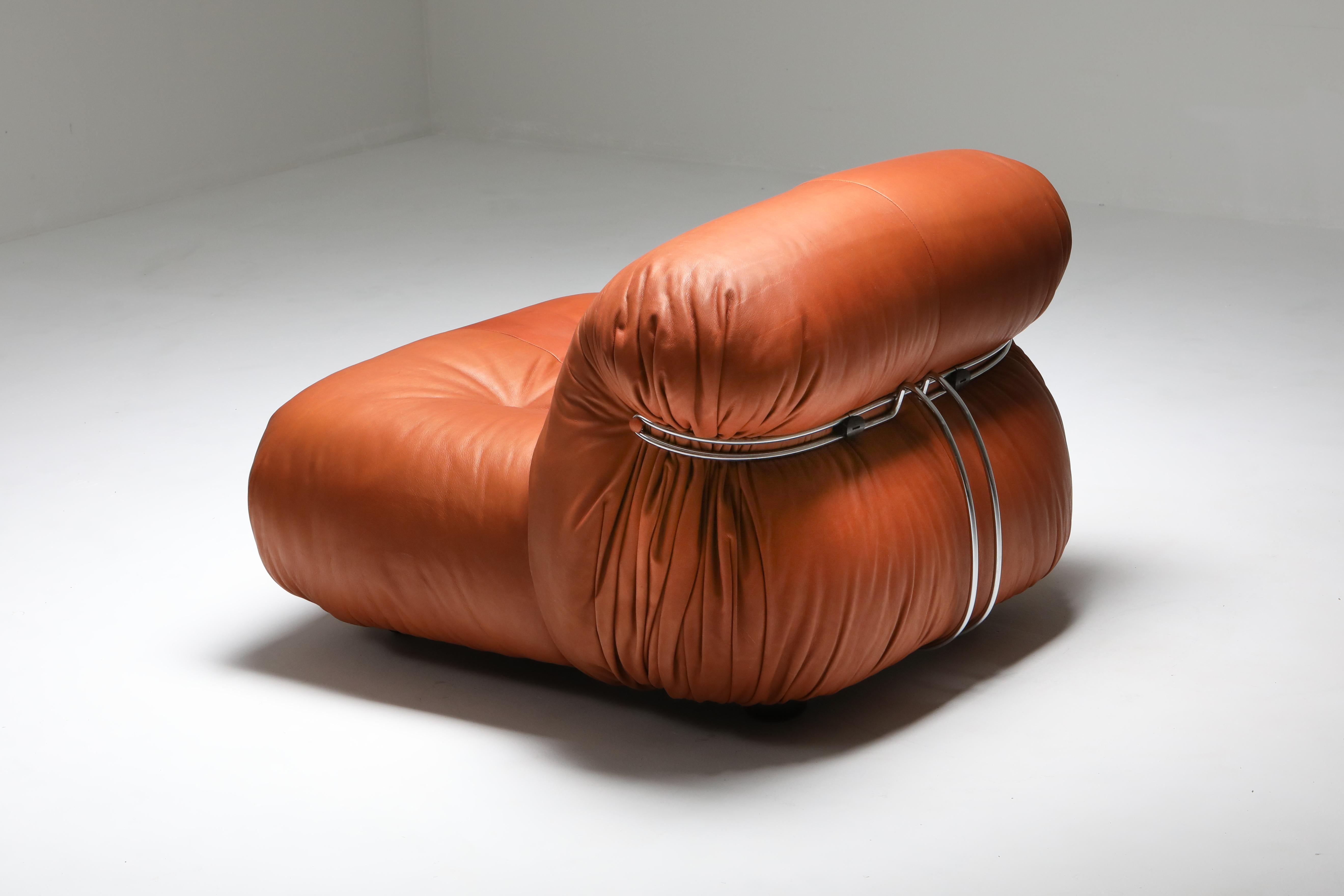 Afra and Tobia Scarpa, reupholstered cognac aniline leather, Cassina, Italy, 1970s
The Soriana collection was meant to express beauty and comfort by using a whole bundle of fabric held by a chrome-plated steel clamp.
The 