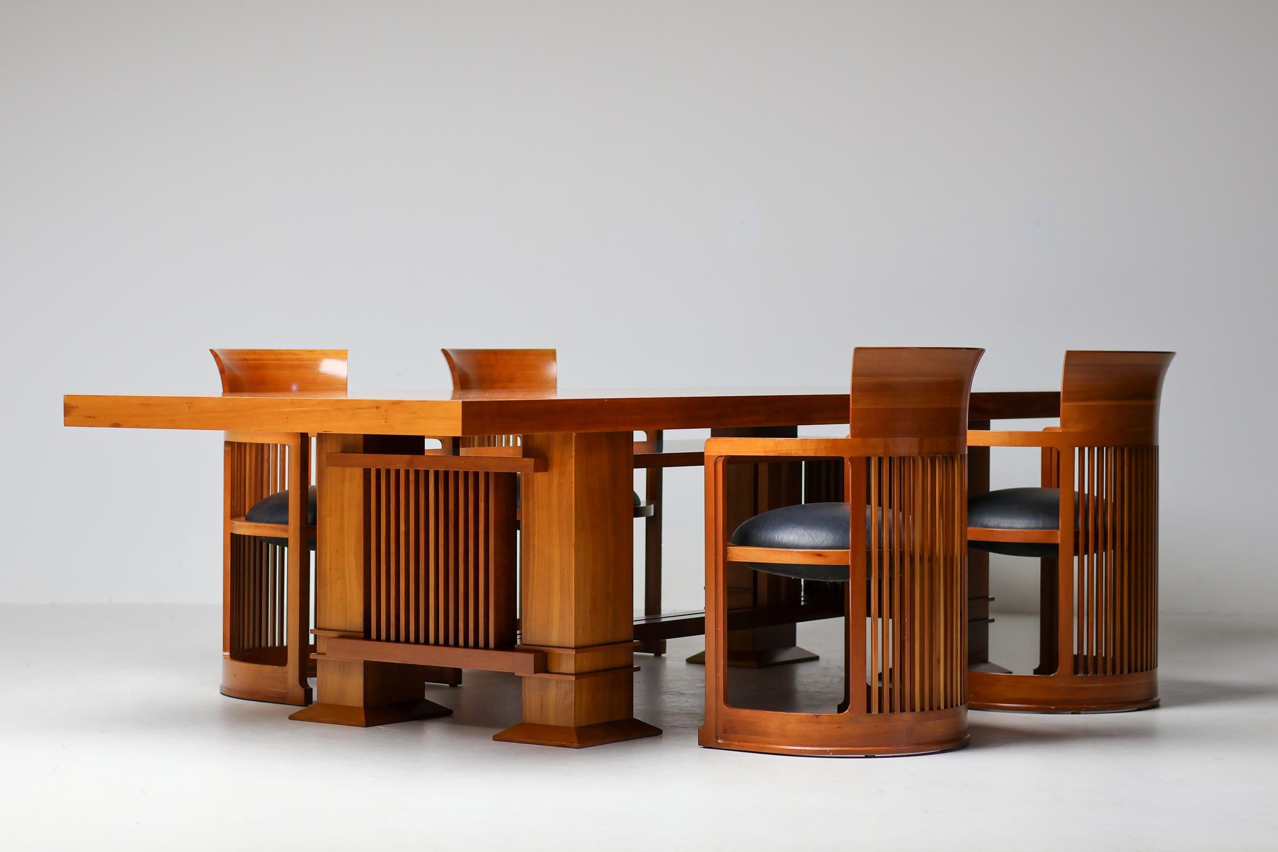 A rare and highly collectible Cassina Taliesin dining table accompanied by four original Barrel chairs, designed by the legendary architect Frank Lloyd Wright. This officially licensed reissue by Cassina honors Wright’s original 1949 design, created