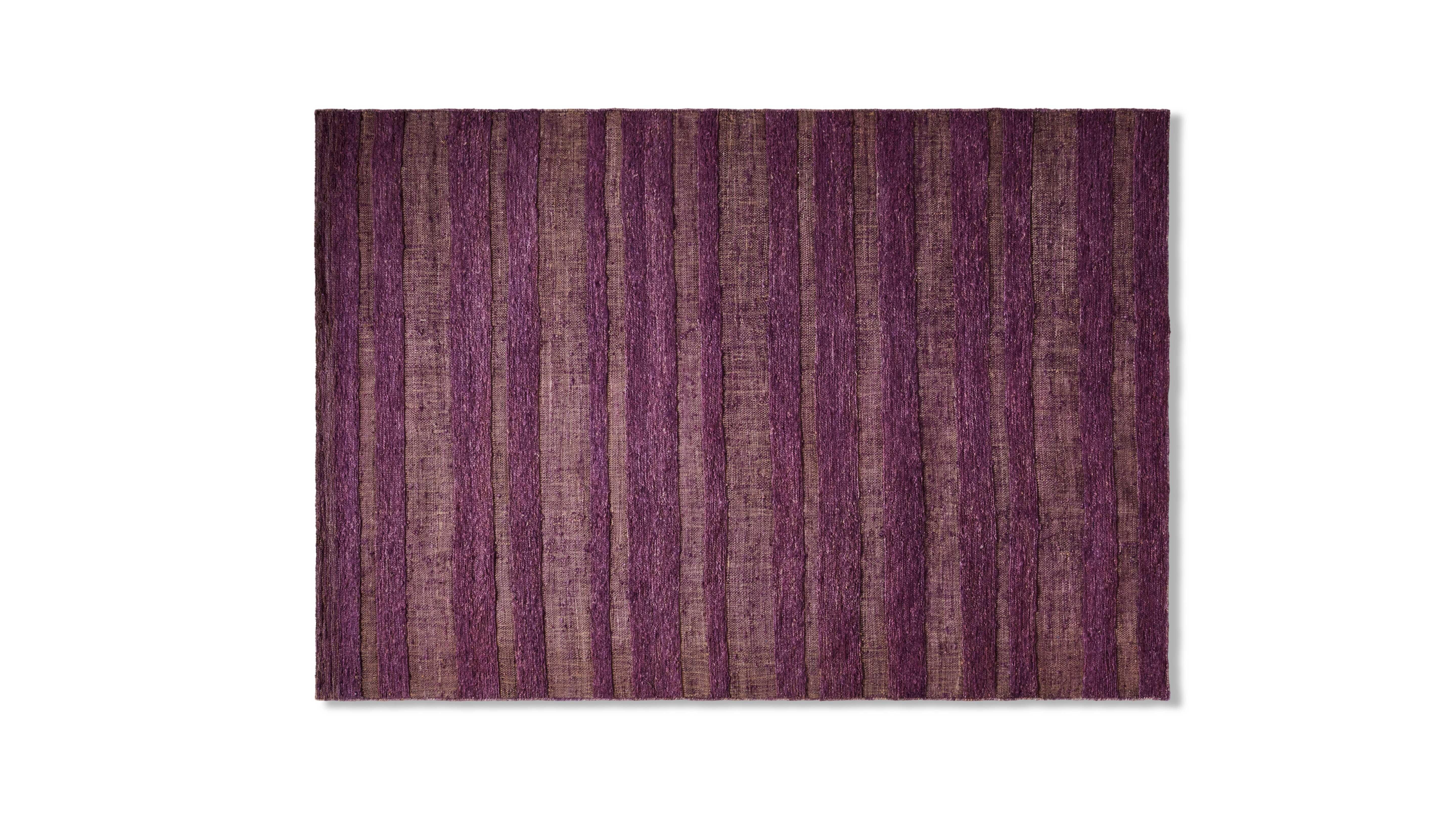 Cassina Ténéré Handgewebter Juteteppich Polychrome Version.

Ein Teppich, der die Natur zelebriert, vollständig handgefertigt aus Jute, nach alten traditionellen Methoden.

Cassina arbeitet mit der Firma Golran zusammen, um die Ténéré-Teppiche zu