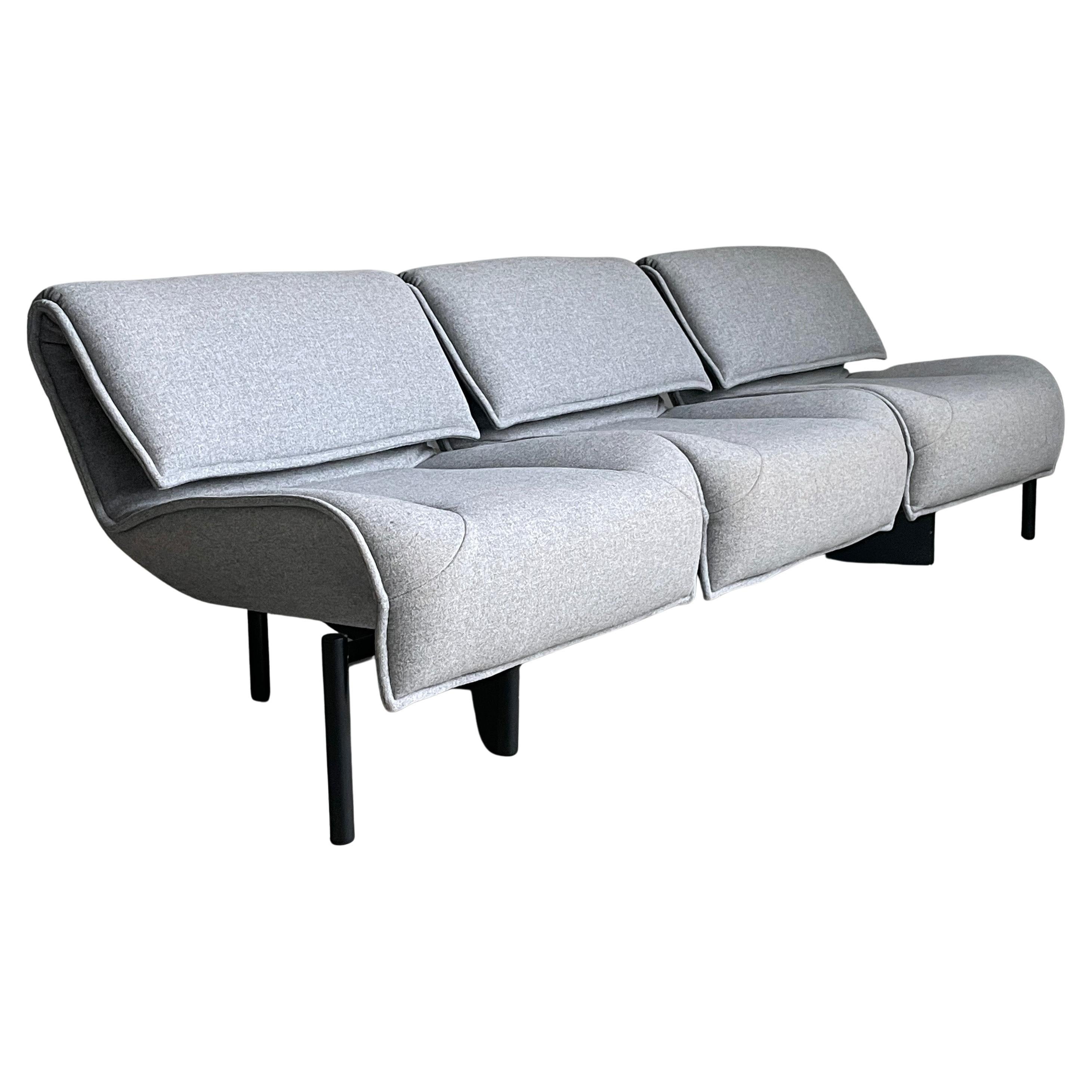 Cassina Veranda 3 seater Sofa by Vico Magistretti and produced by Cassina, Italy in the late 1980's. Based on the Maralunga Sofa with fold down back rest. Adjustable three seater design with the possibility to align the two end seats or swivel each