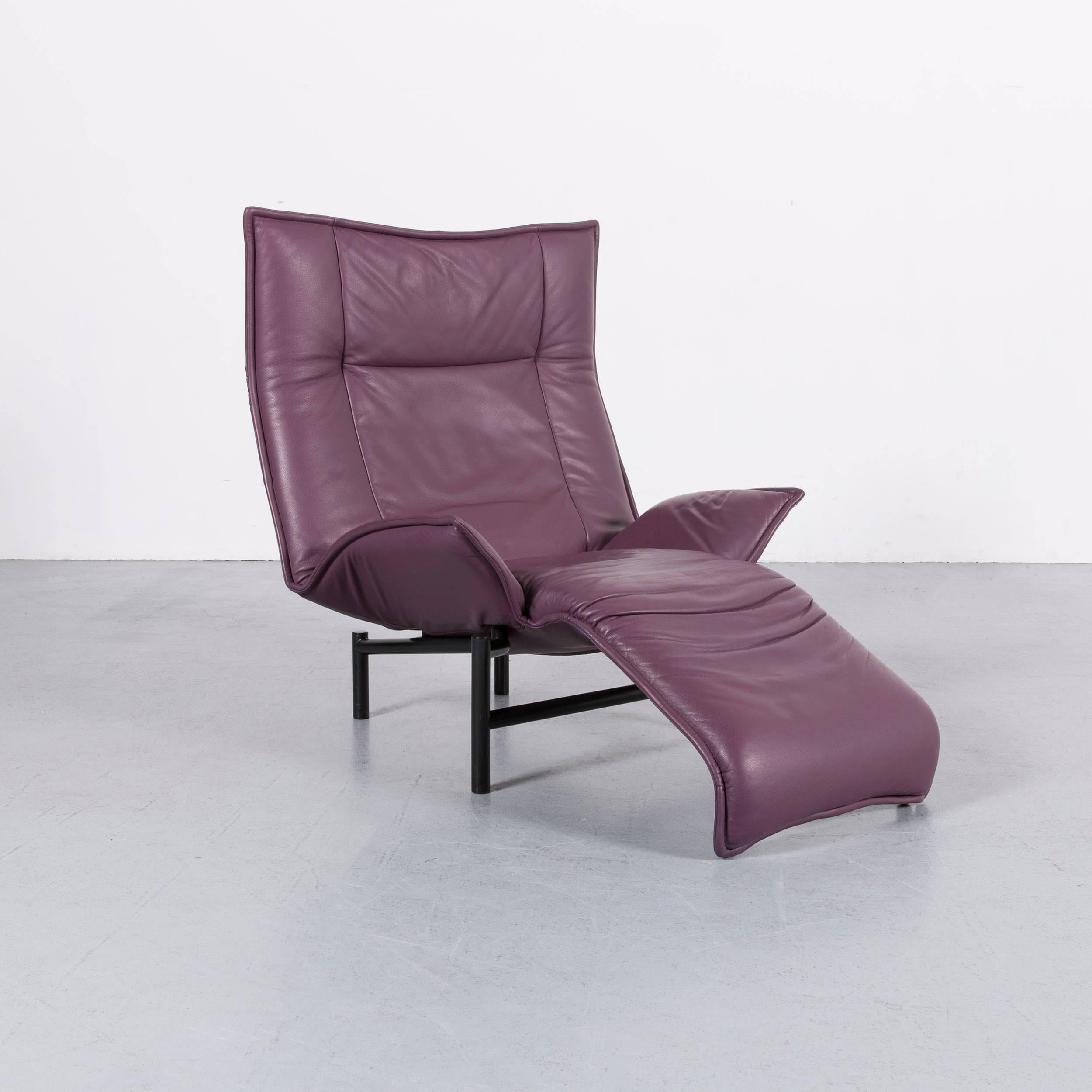 We bring to you an Cassina Veranda designer leather armchair in purple with recliner function.