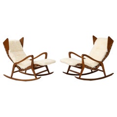 Cassina Walnut Rocking Lounge Chairs Model 572 in Ivory Kalgan Lambskin, 1950s