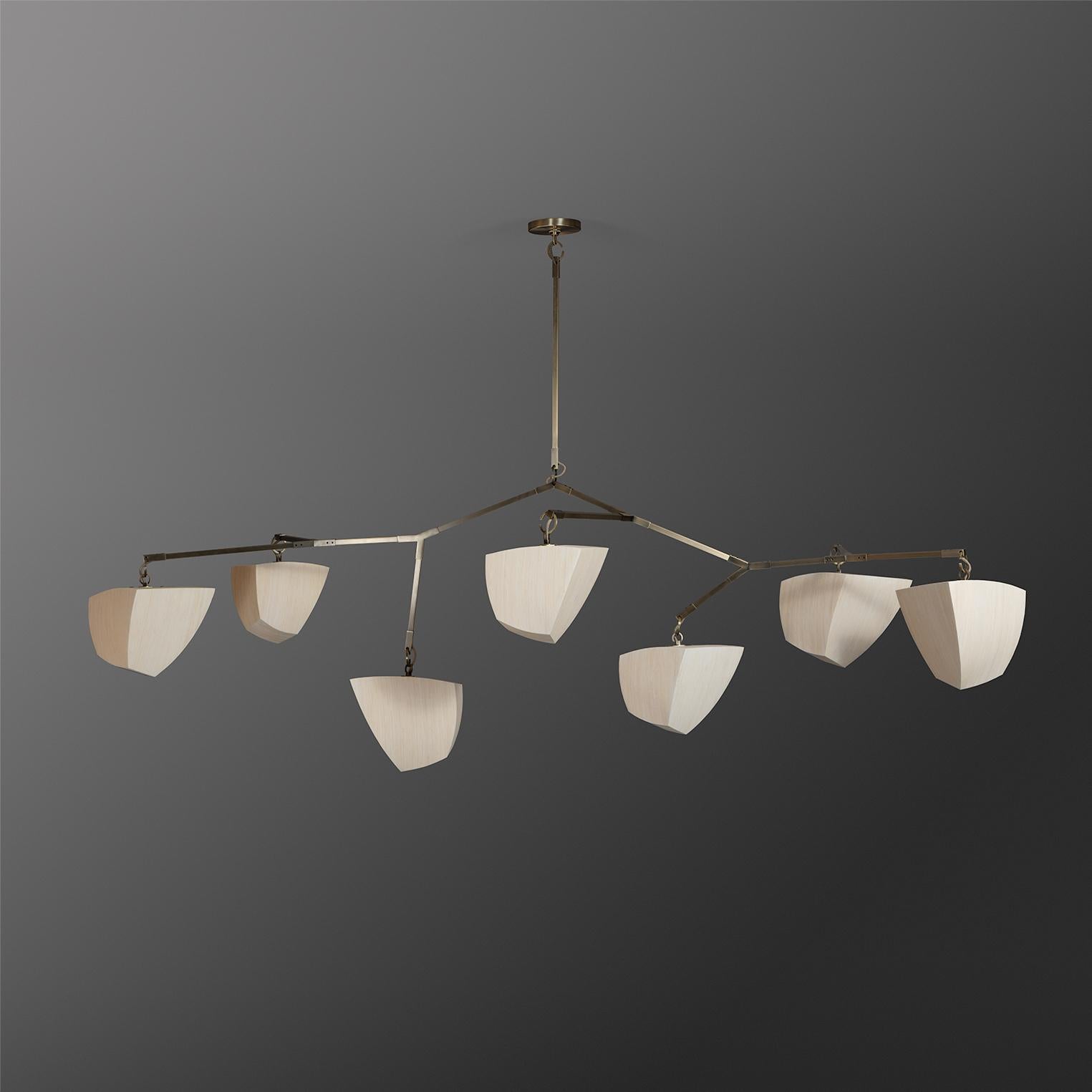 This is a horizontal mobile chandelier with 7 glowing handmade bamboo polyhedrons. 
Also available with porcelain polyhedrons.

The Cassiopeia series was designed for spaces with lower ceiling heights where a horizontal chandelier is
