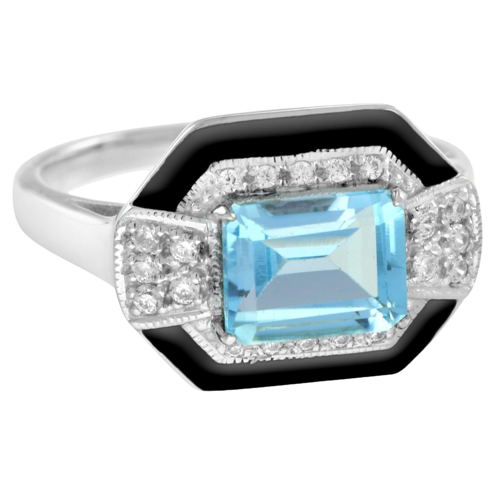 Bague en or blanc 18 carats avec topaze bleue taille émeraude, diamants et émail noir