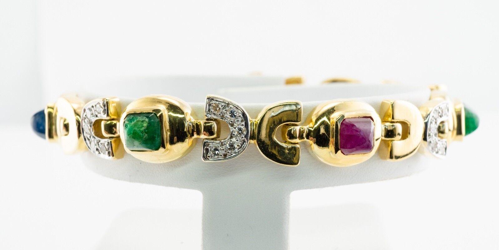 Cassis Emerald Ruby Sapphire Diamond Bracelet 18K Gold

This gorgeous bracelet is finely crafted in solid 18K Yellow gold and also hallmarked 