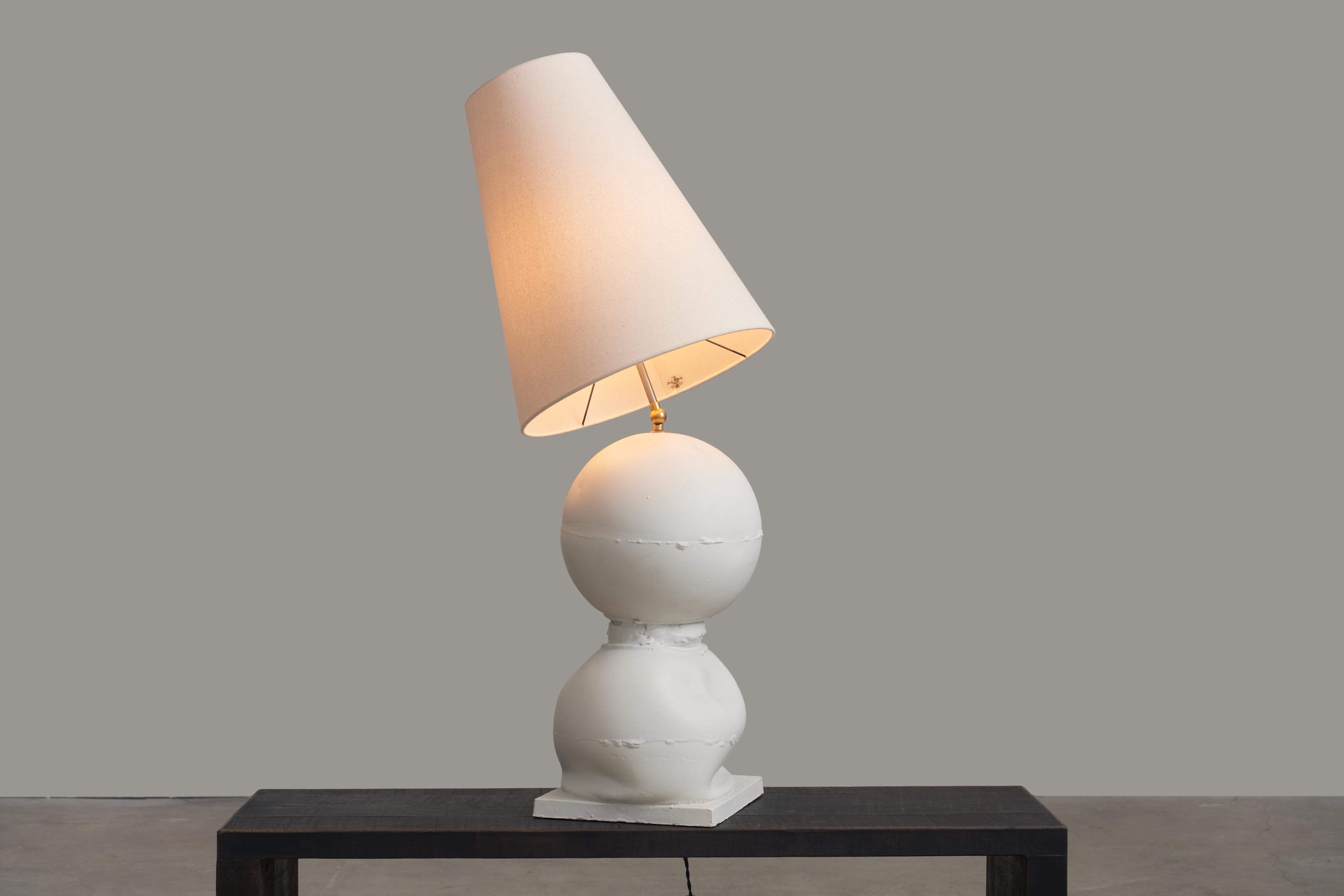 Cassola and Cassola Table Lamp by Jenna Basso Pietrobon
Dimensions: W 27 x D 27 x H 115 cm
Materials: Ceramic.
Weight: 5 kg

Jenna Basso Pietrobon, born in 1986, is an artist whose work delves into societal issues through the lens of her personal
