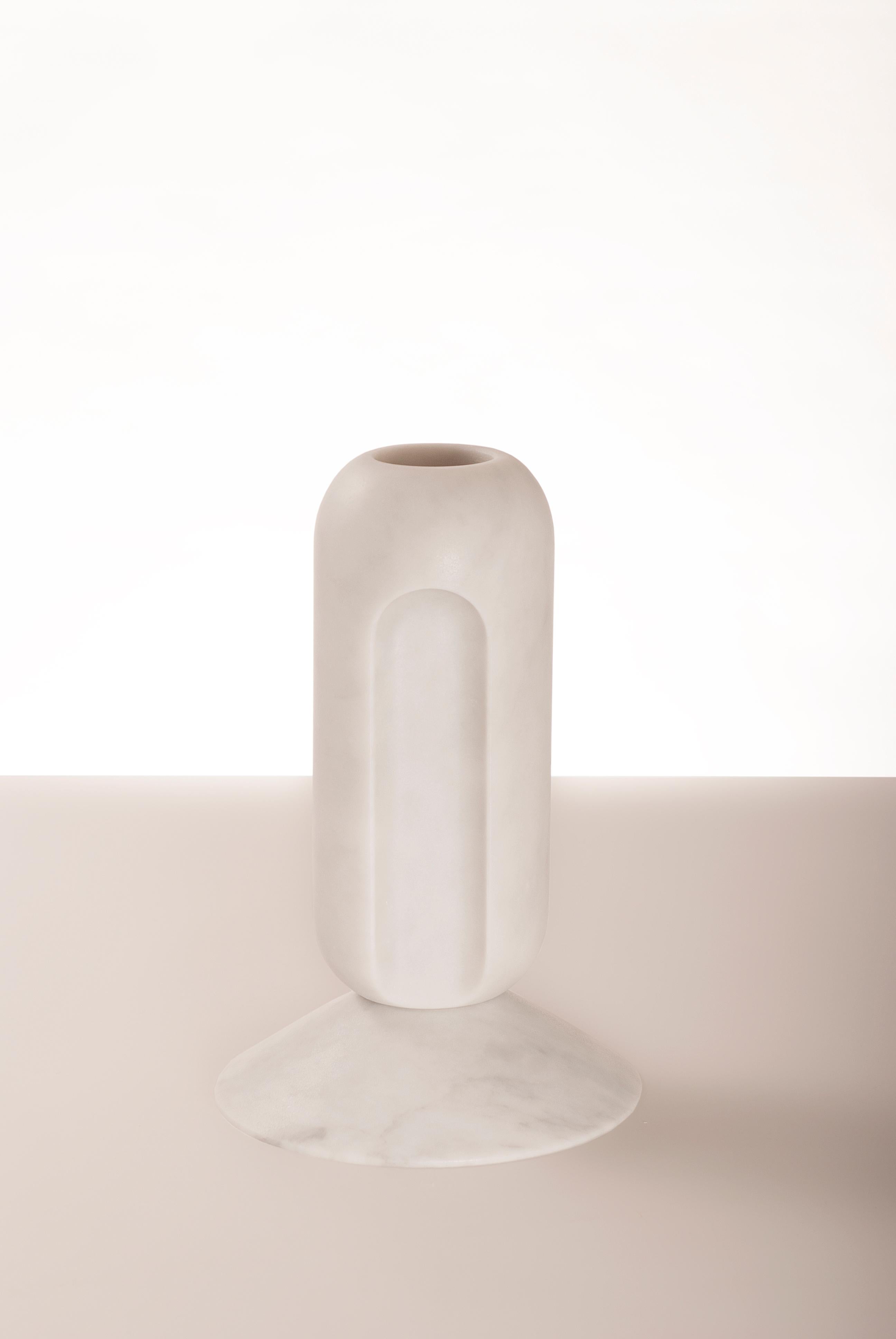 Cassus - marble contemporary vase - Valentina Cameranesi
Materials: White carrara marble (Also available in noir antique and green jade)
Dimensions: 36 x 24 x 24 cm

The “Avalon” series consists of 3 sculptural vases, made of White Arabescato