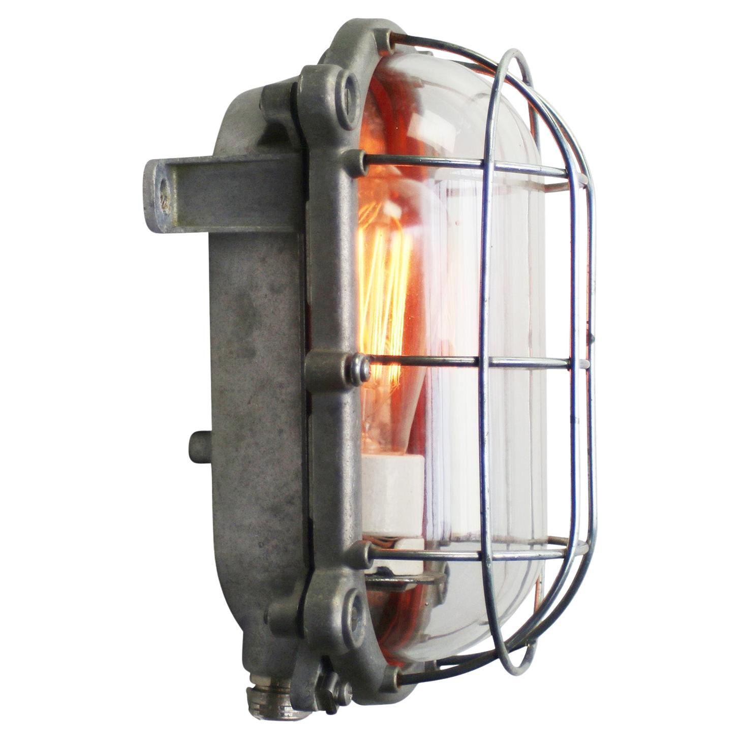 Cast Alu Industrial Clear Glass Wall Lamps Sconces by Schuch For Sale