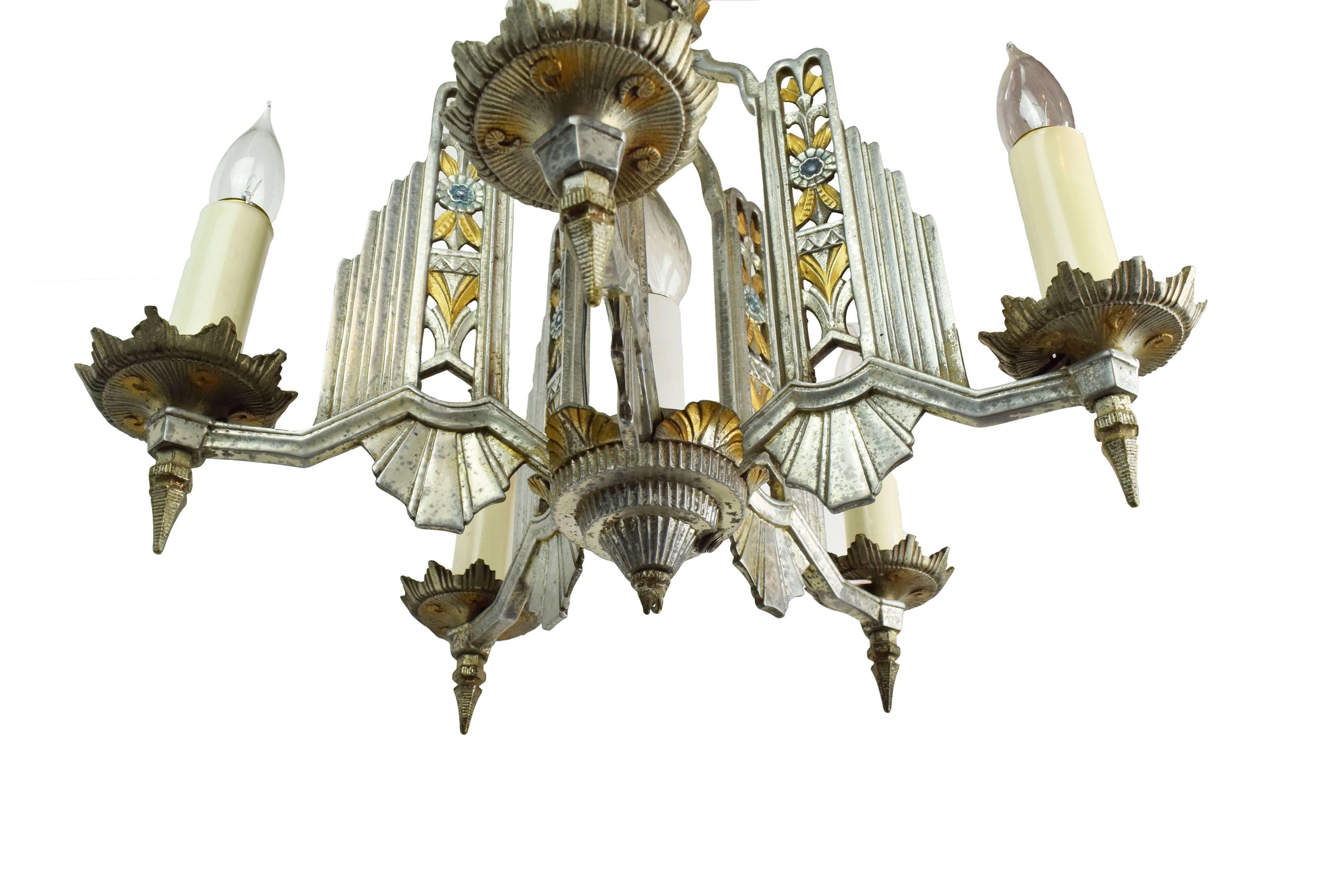 This beautiful cast aluminum chandelier with Art Deco detailing will be the perfect addition to your home! The Art Deco style will look great the foyer of your home,

circa 1930
Condition: Excellent
Finish: Original
Country of origin: USA
Five