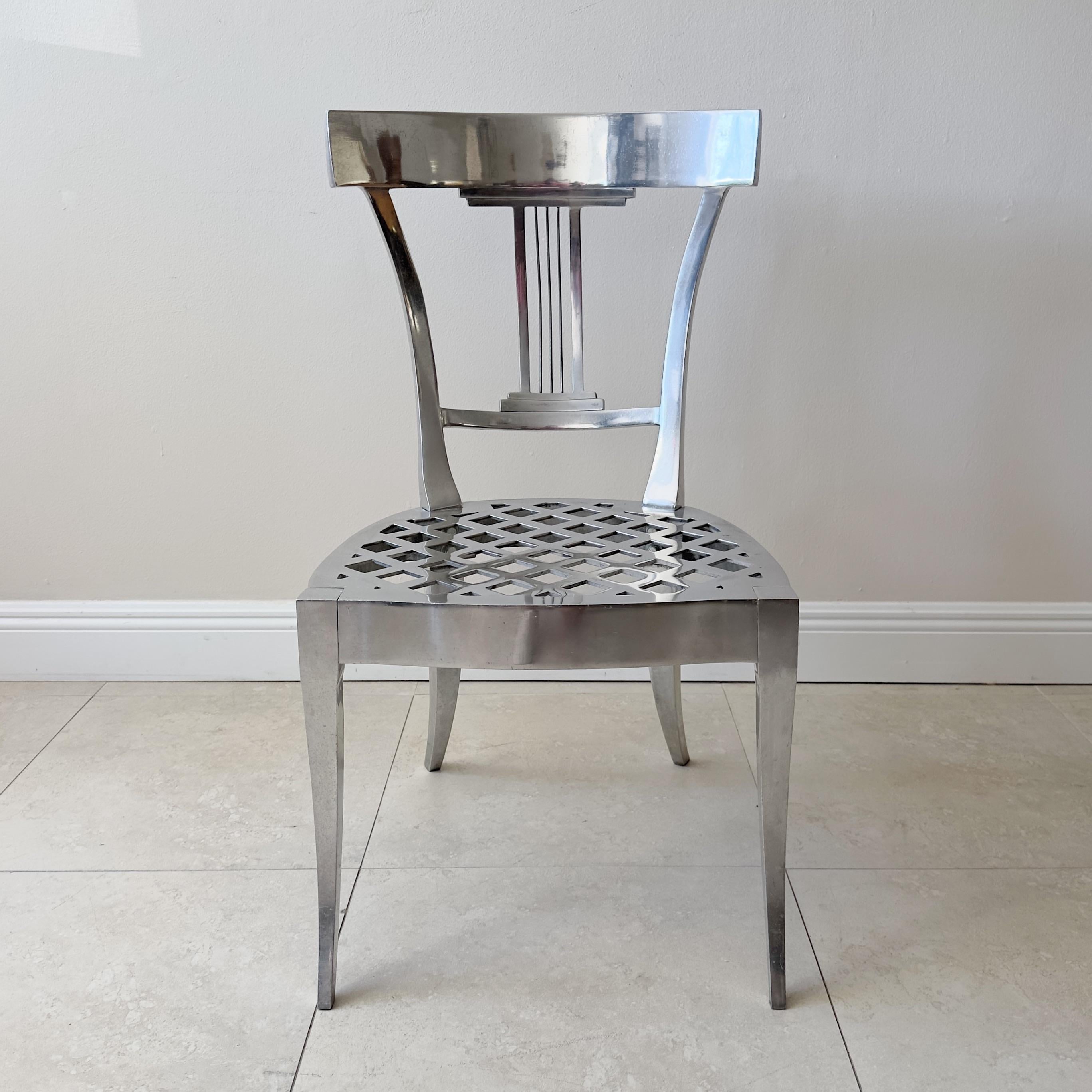 Contemporary Polished aluminum Klismos side accent chair
This chair is suitable to be used indoors or outdoors. 
Unsigned.