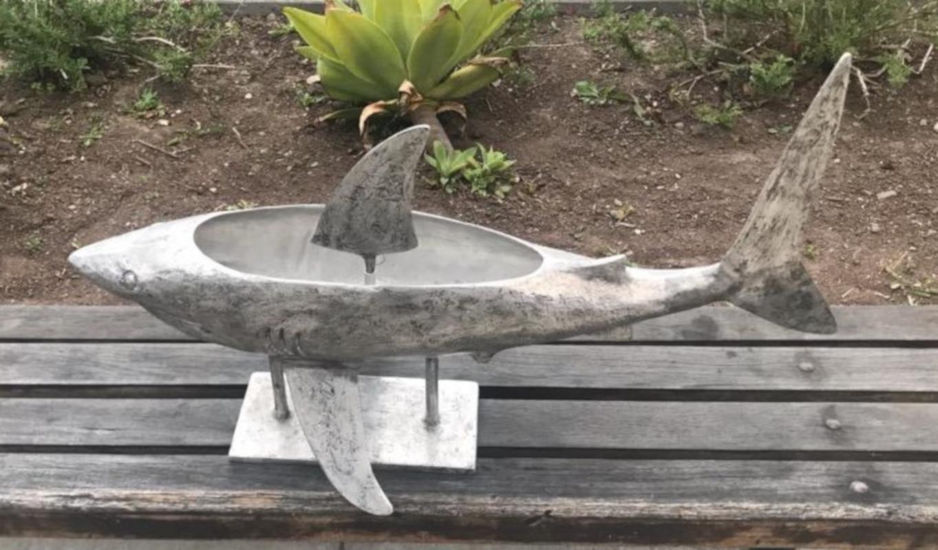 This cool handmade midcentury aluminum shark ice server and container with ice pick inside is most unusual. It is late 20th century and has a amazing presents. Great for serving seafood at your next event. This is a cool piece of Mid-Century Modern