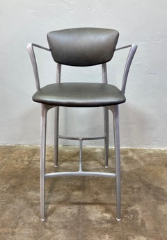 Cast Aluminum Stool with Arms and Fresh Leather Upholstery