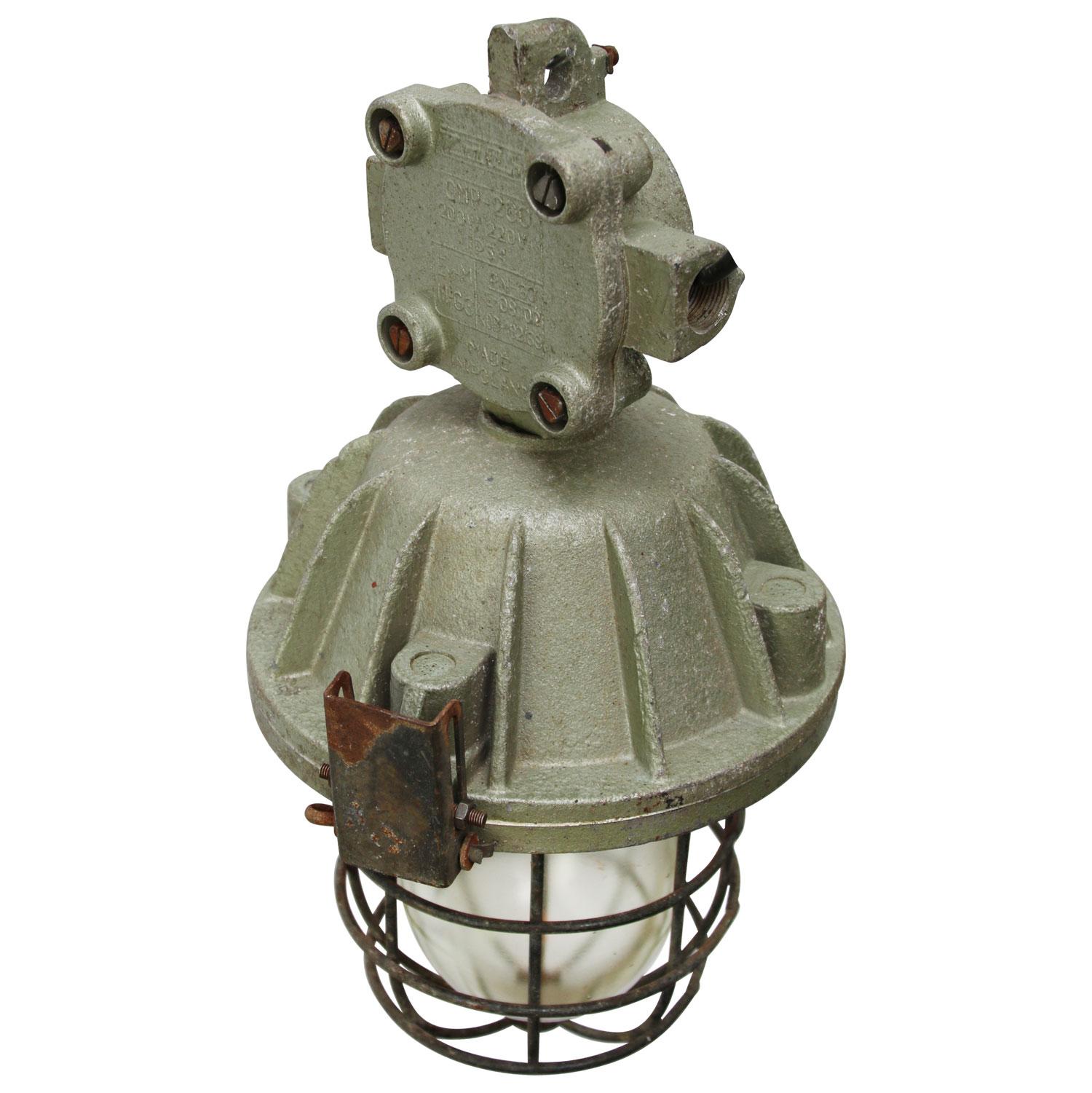 Industrial hanging lamp
silver grey green cast aluminum
clear glass

Weight: 9.00 kg / 19.8 lb

Priced per individual item. All lamps have been made suitable by international standards for incandescent light bulbs, energy-efficient and LED