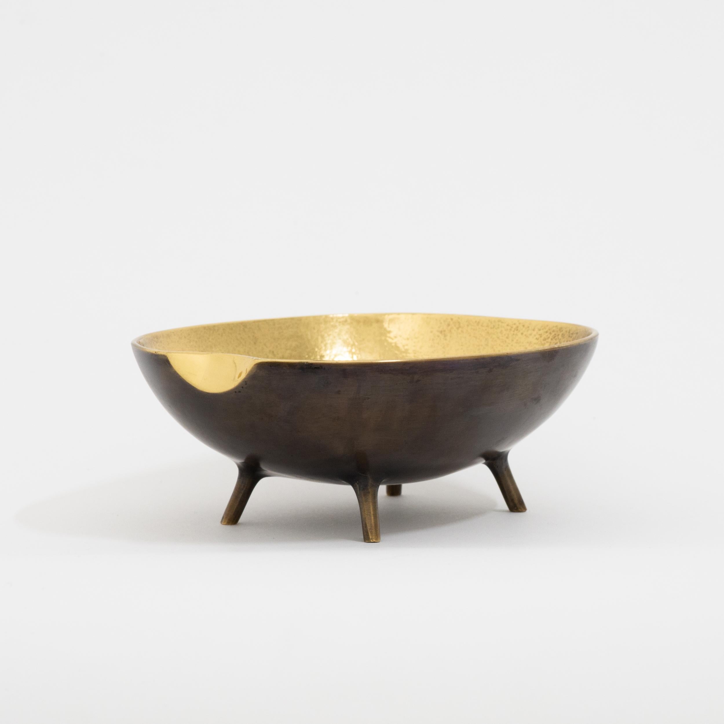 Handmade cast brass bowl legs with a bronze patina on the outside and textured polished brass on the inside.

Each of these charming, original and elegant bowls are handmade individually. Cast using very traditional techniques, the noble material is