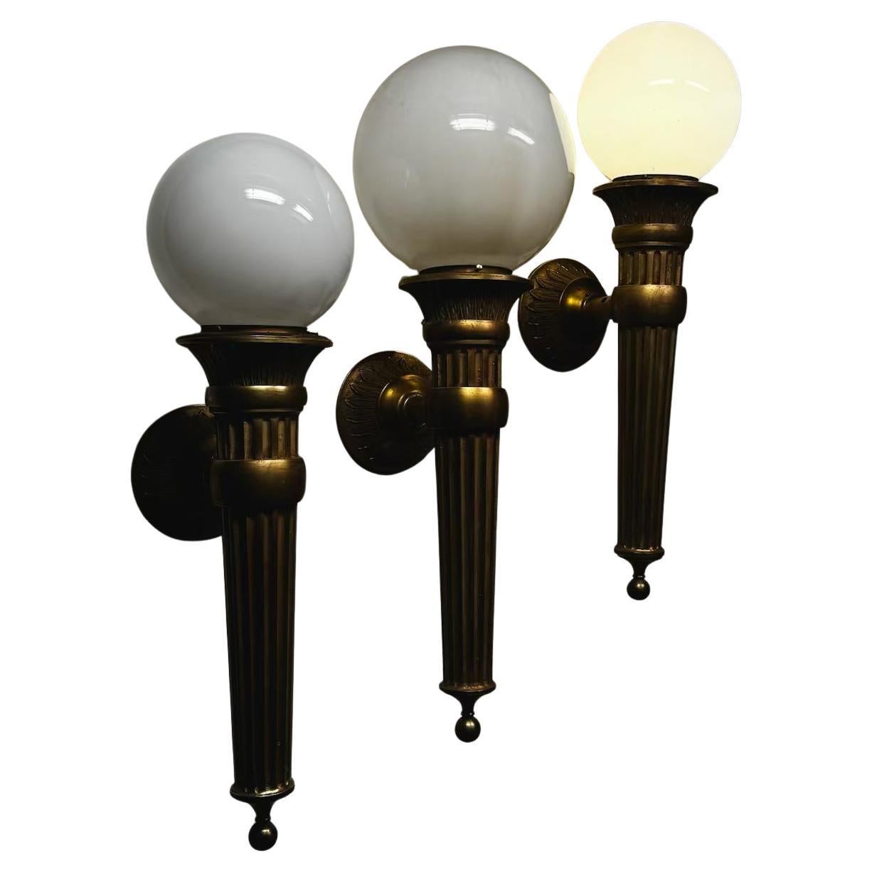 A great set of solid brass sconces with option for 8 or 10 inch glass ball shades. These lights were once gas connected and converted to electric years ago .  We are told they originally came from a bank building in Vancouver .  Rarely do we find