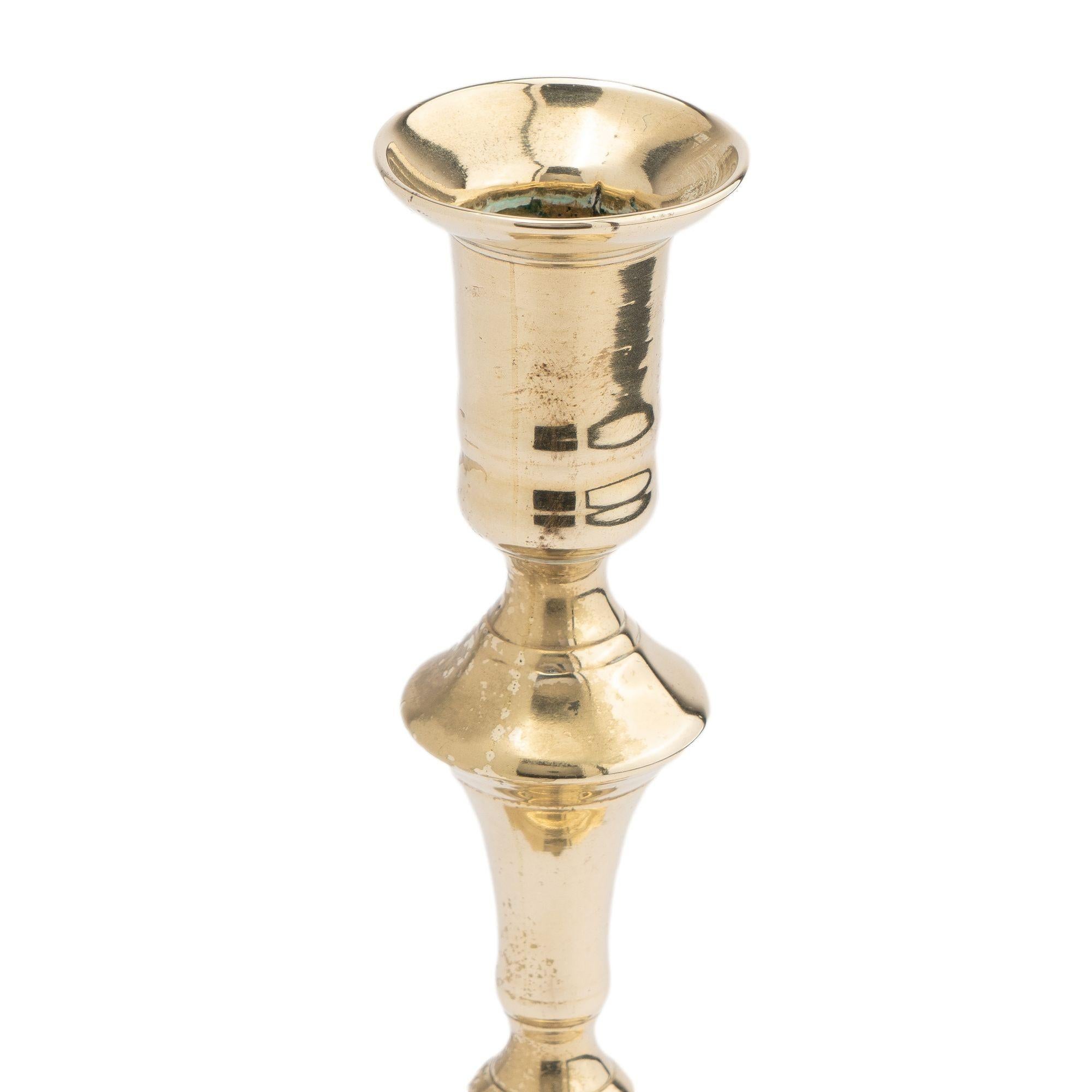 18th Century Cast brass Queen Anne scollop base candlestick, c. 1760 For Sale