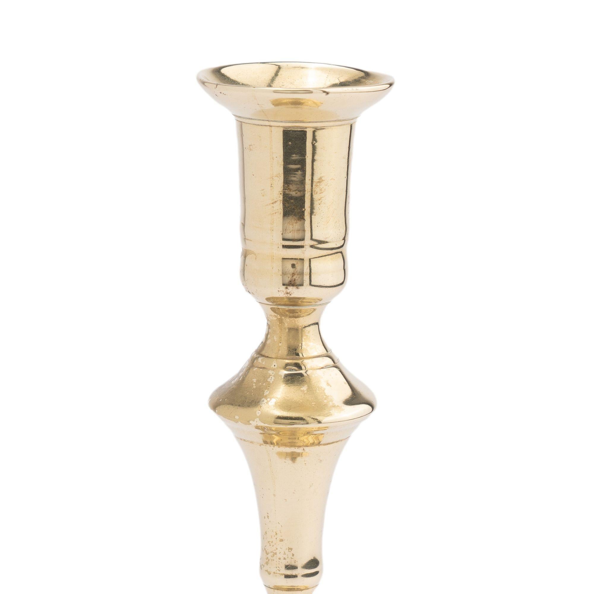 Brass Cast brass Queen Anne scollop base candlestick, c. 1760 For Sale