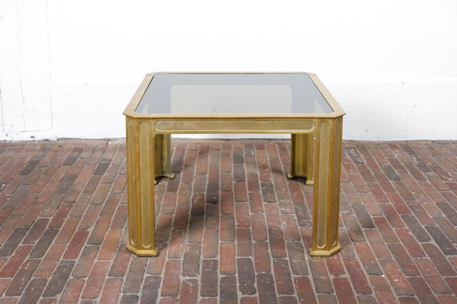 Super chic coffee table in solid bronze with glass top designed by Peter Van Heeck.
Cast Bronze, heavy and pure quality.

2 identical Tables available !