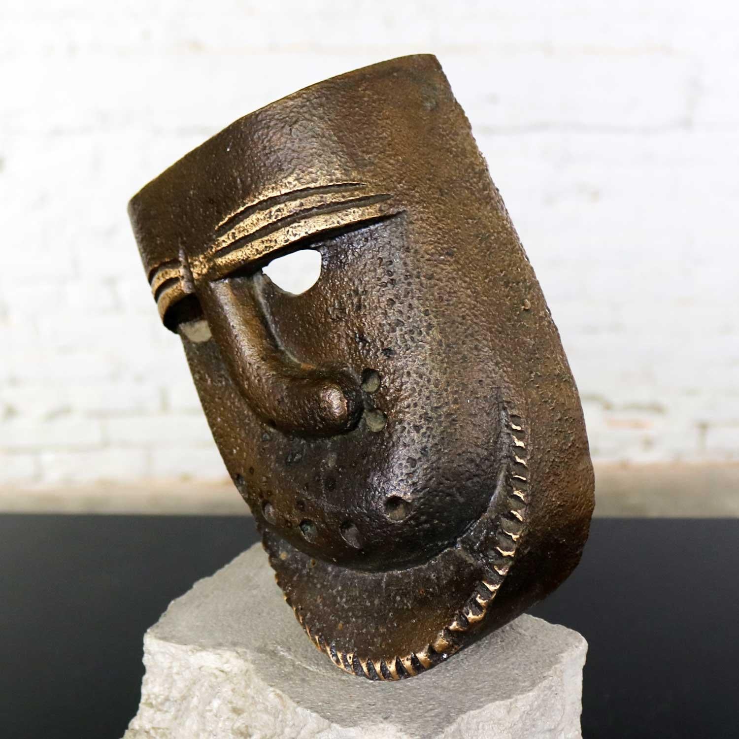 Cast Bronze African Mask Sculpture with Crooked Nose Mounted on Limestone Stand 5