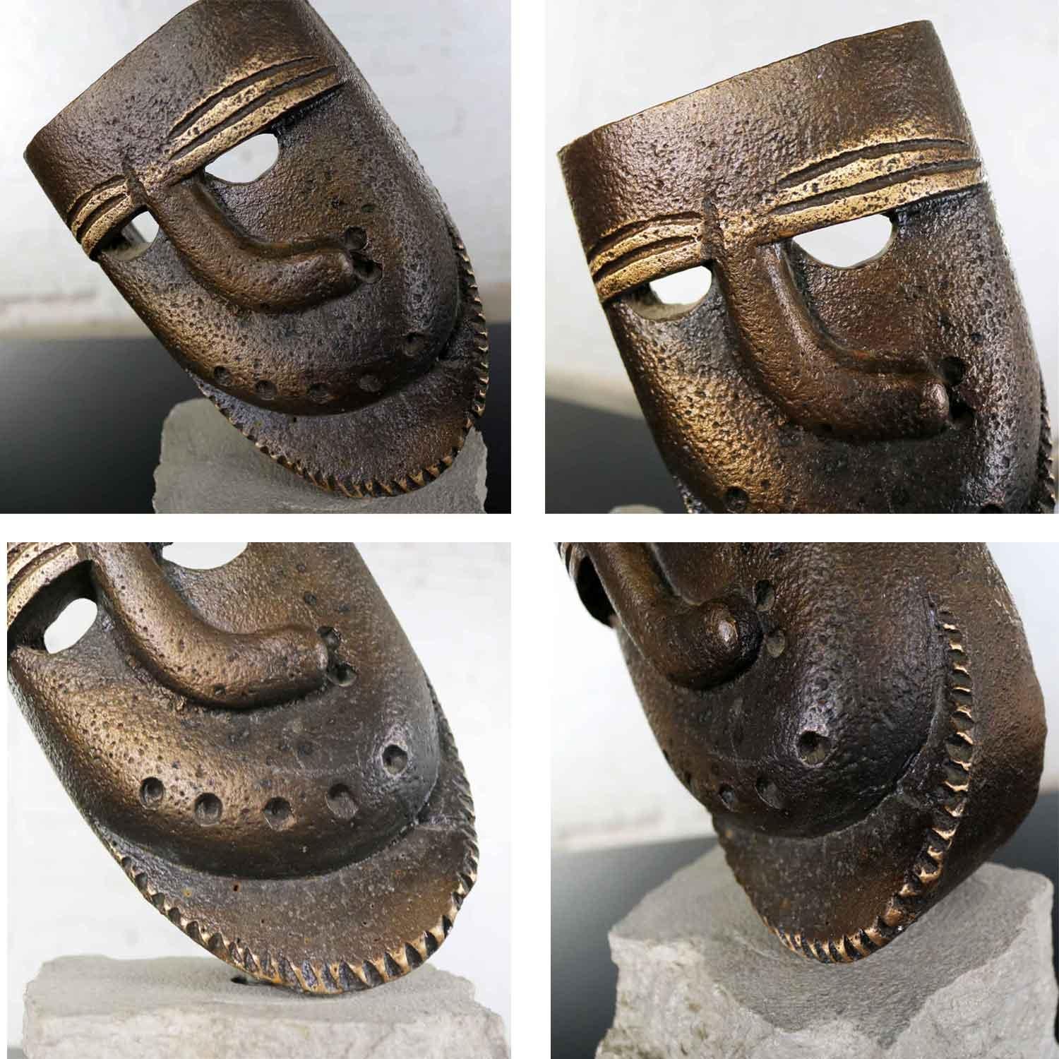 Cast Bronze African Mask Sculpture with Crooked Nose Mounted on Limestone Stand 6