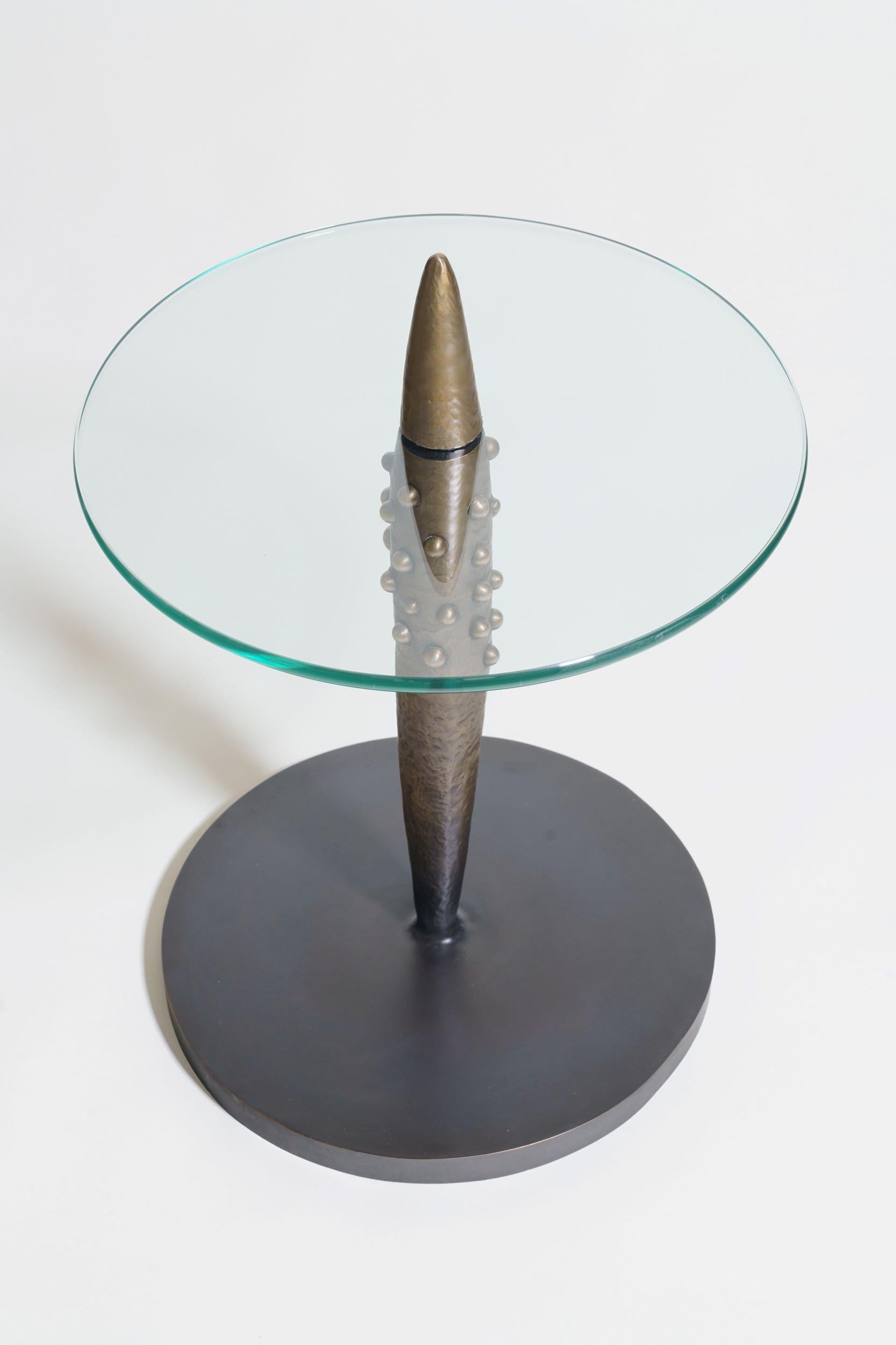 Side Table in cast bronze and glass. 2024.
Dimensions: 26