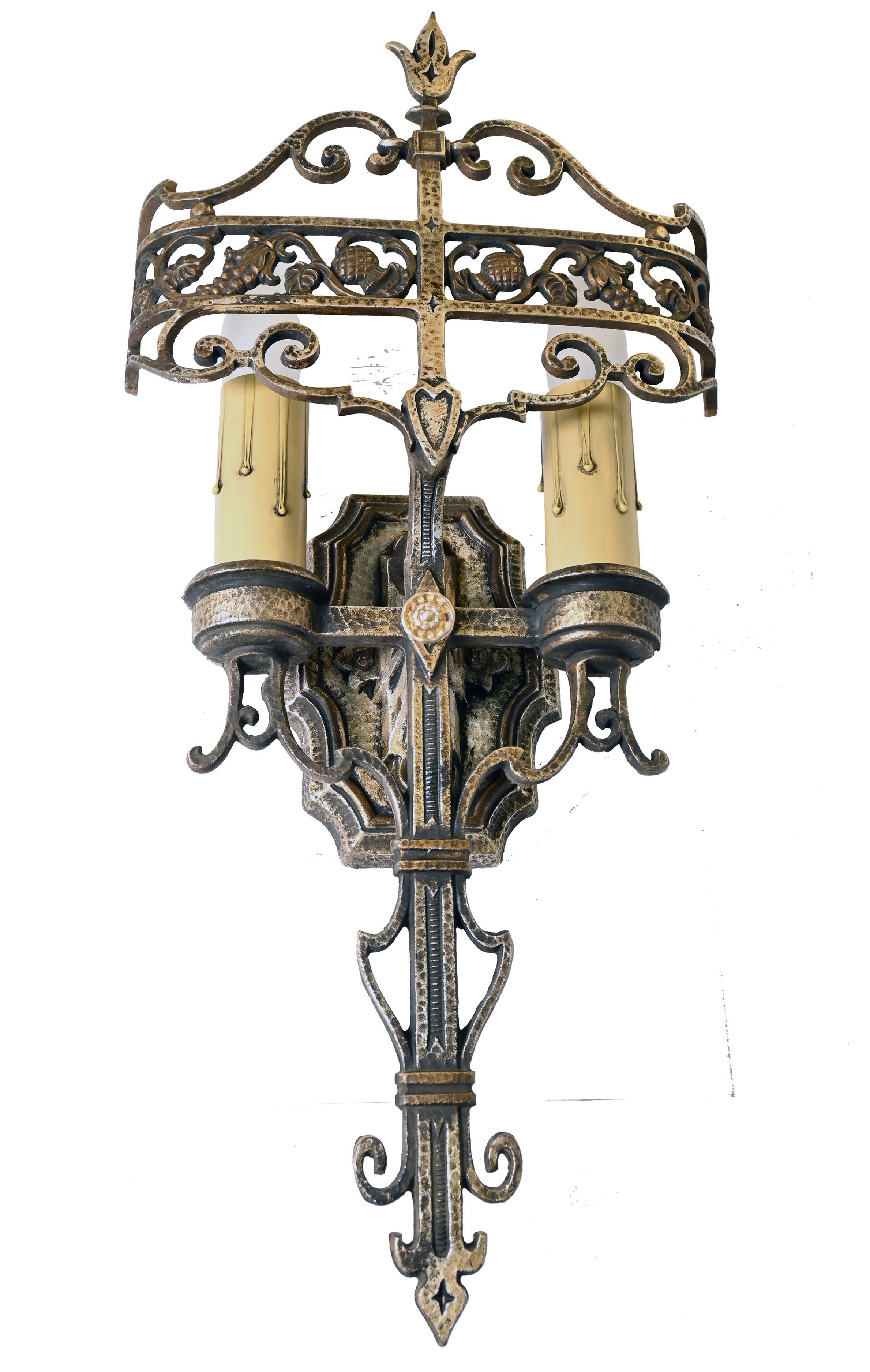 5 Available / sold individually 

AA# 60176
Circa: 1929
Condition: Age Consistent
Material: cast bronze 
Finish: original gold & pewter wash
Country of origin: USA
Illumination: 2 medium sockets
Dimensions: 19” height x 9” wide x 3 1/4”