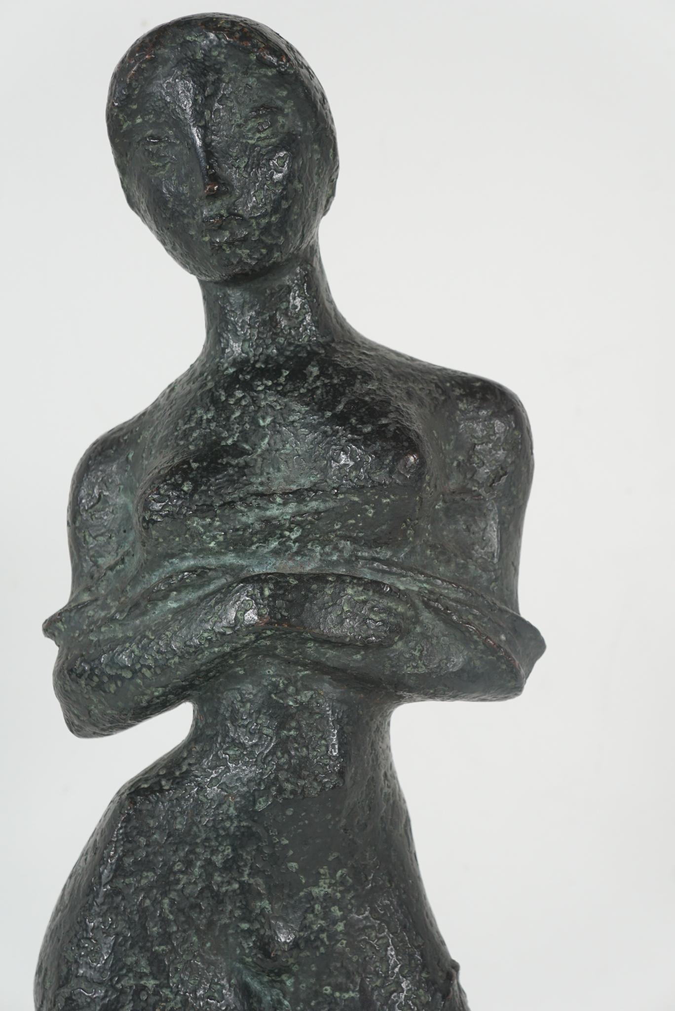 this work by famed Sculpture and Painter Georges Oudot was cast circa 1955 and bears his signature and the mark EA indicating its an artist proof, the foundry stamp of Susse Fondeur Paris. Entitled “Femme Debout au Drape” the work is dynamic and